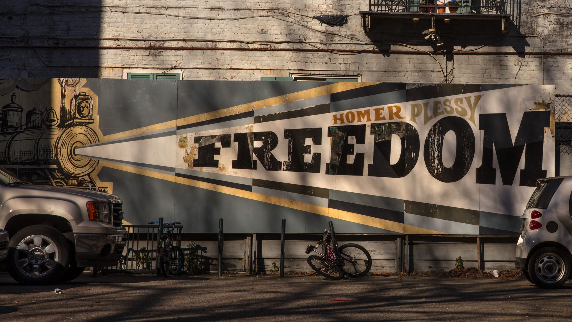 Sign with a train with Homer Plessy Freedom printed on it on 26th February 2020 at Homer Plessy Community School, New Orleans, Louisiana, United States.