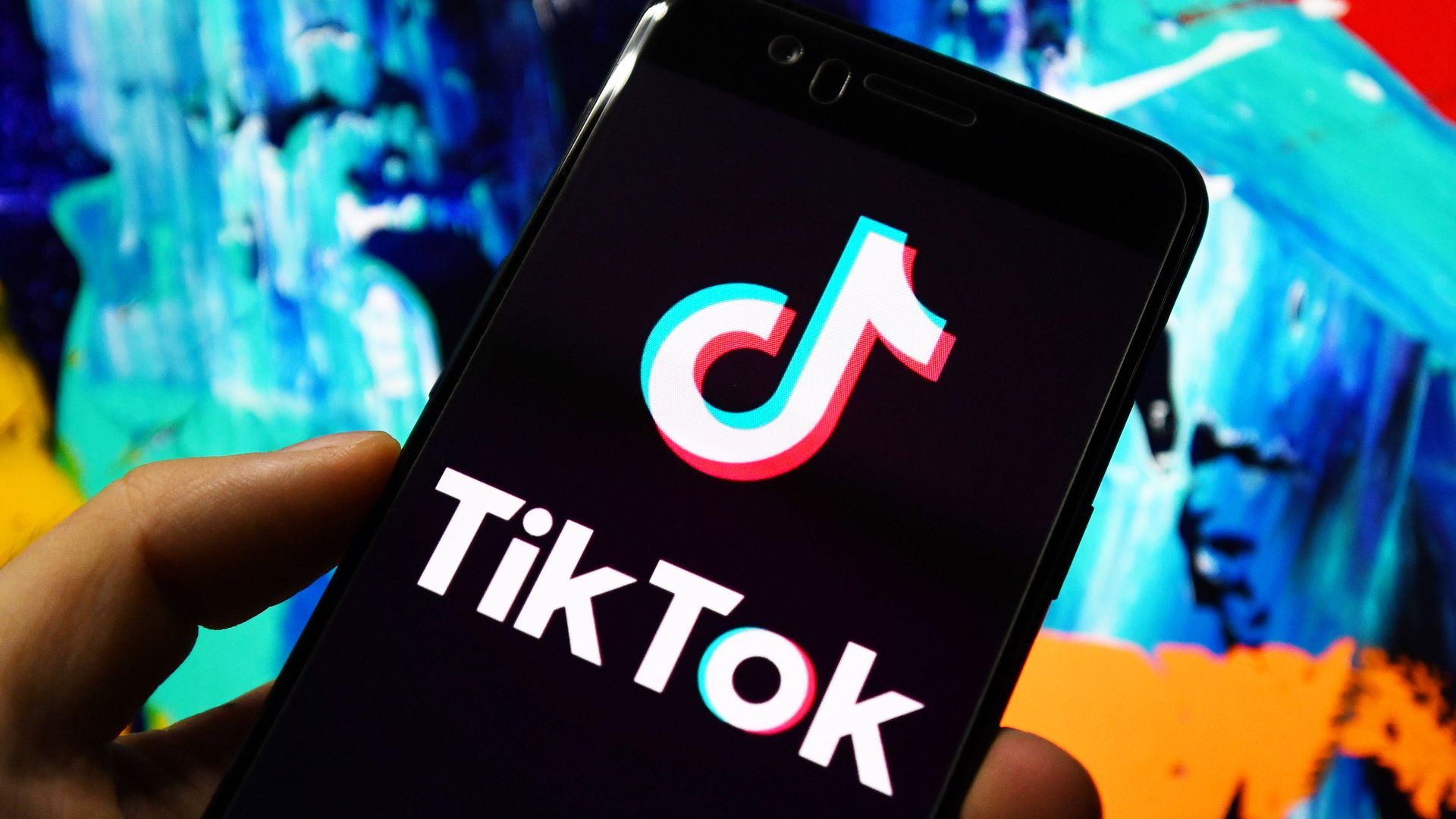 In this photo illustration a TikTok logo is seen displayed on a smartphone.