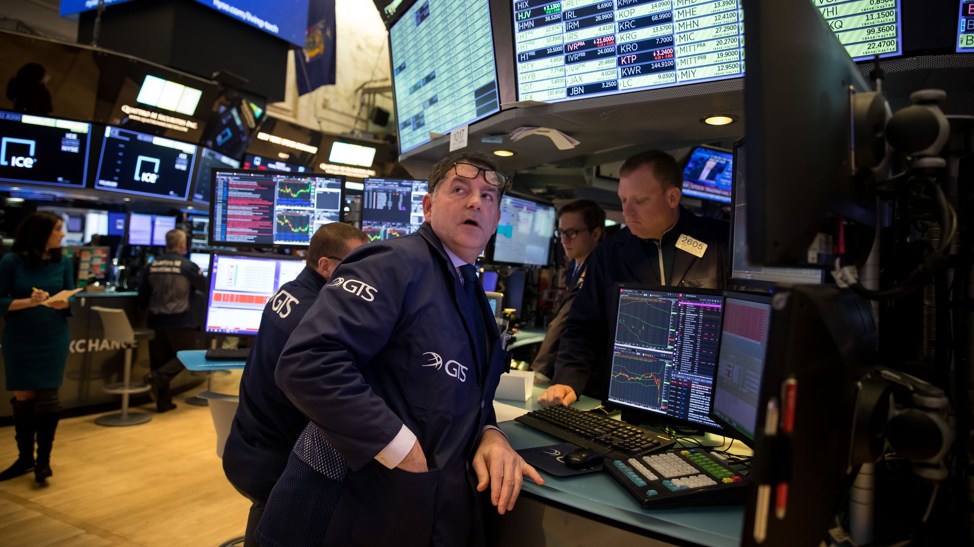 Traders working at the New York Stock Exchange