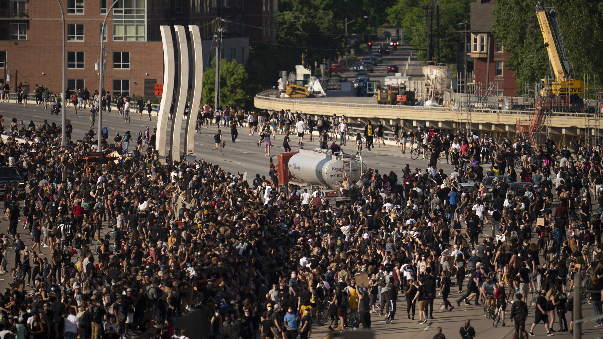 People climbed atop the tanker as continued to move after plowing into protesters