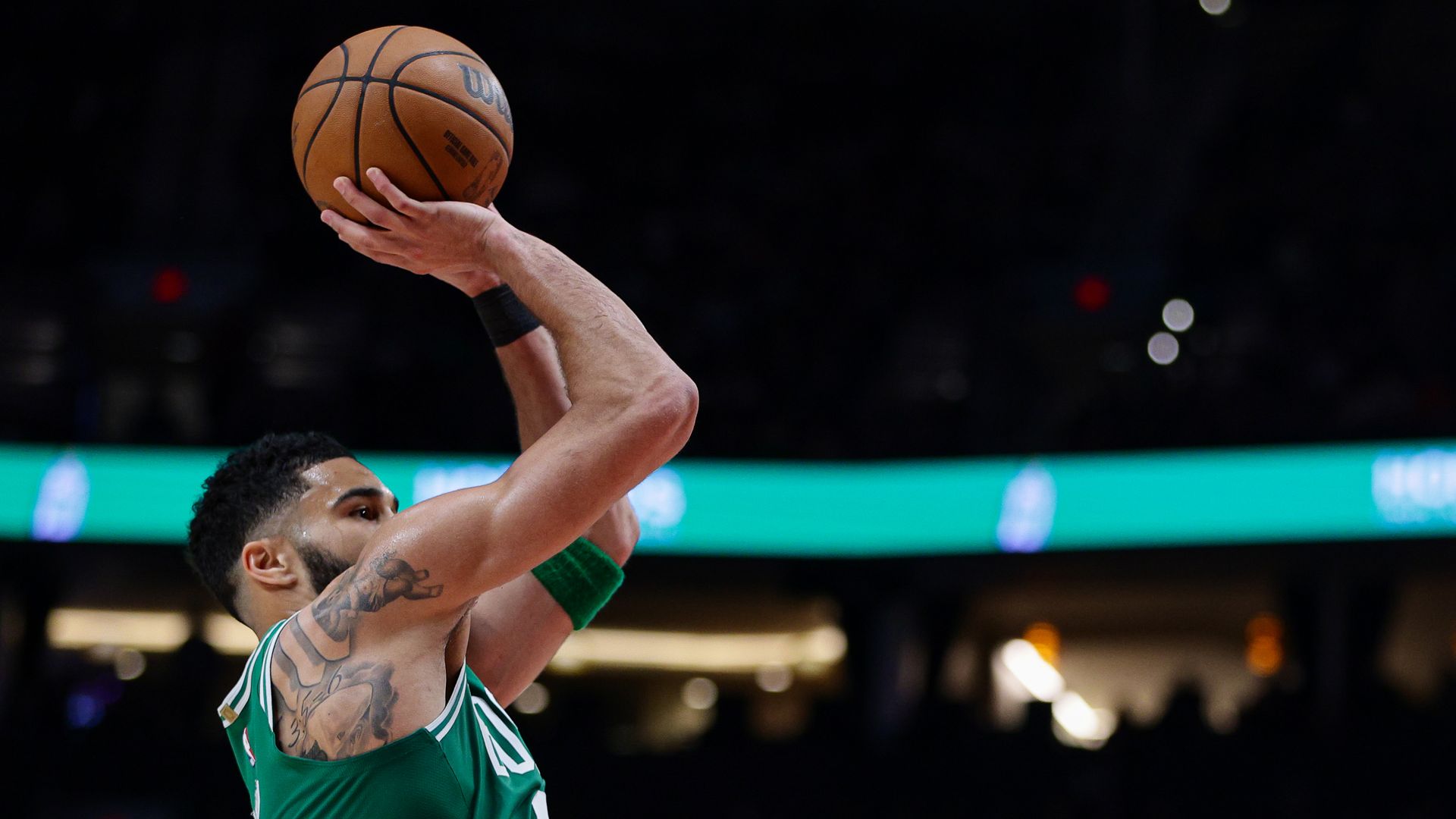 Boston Celtics player Jayson Tatum shooting a basketball