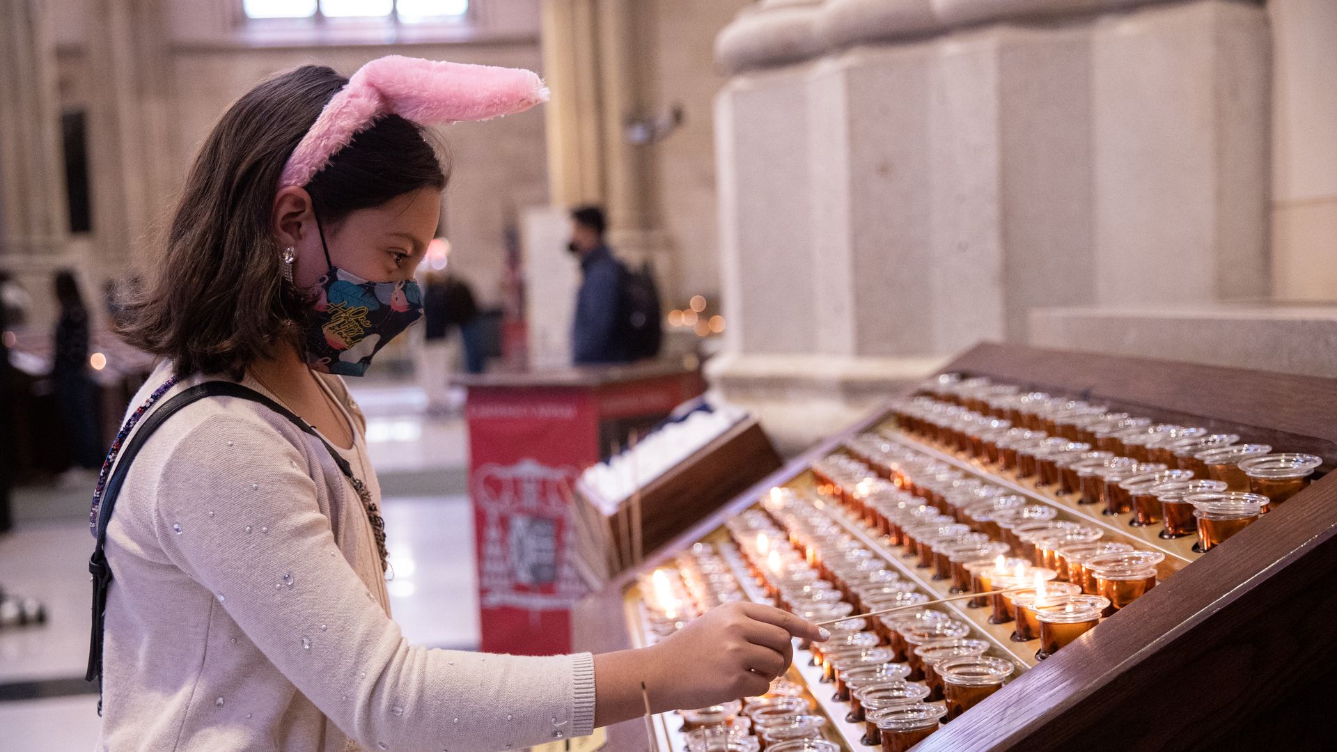 A girl wears a bunny hairband at Saint Patrick's Cathedral on April 4, 2021 in New York City. 