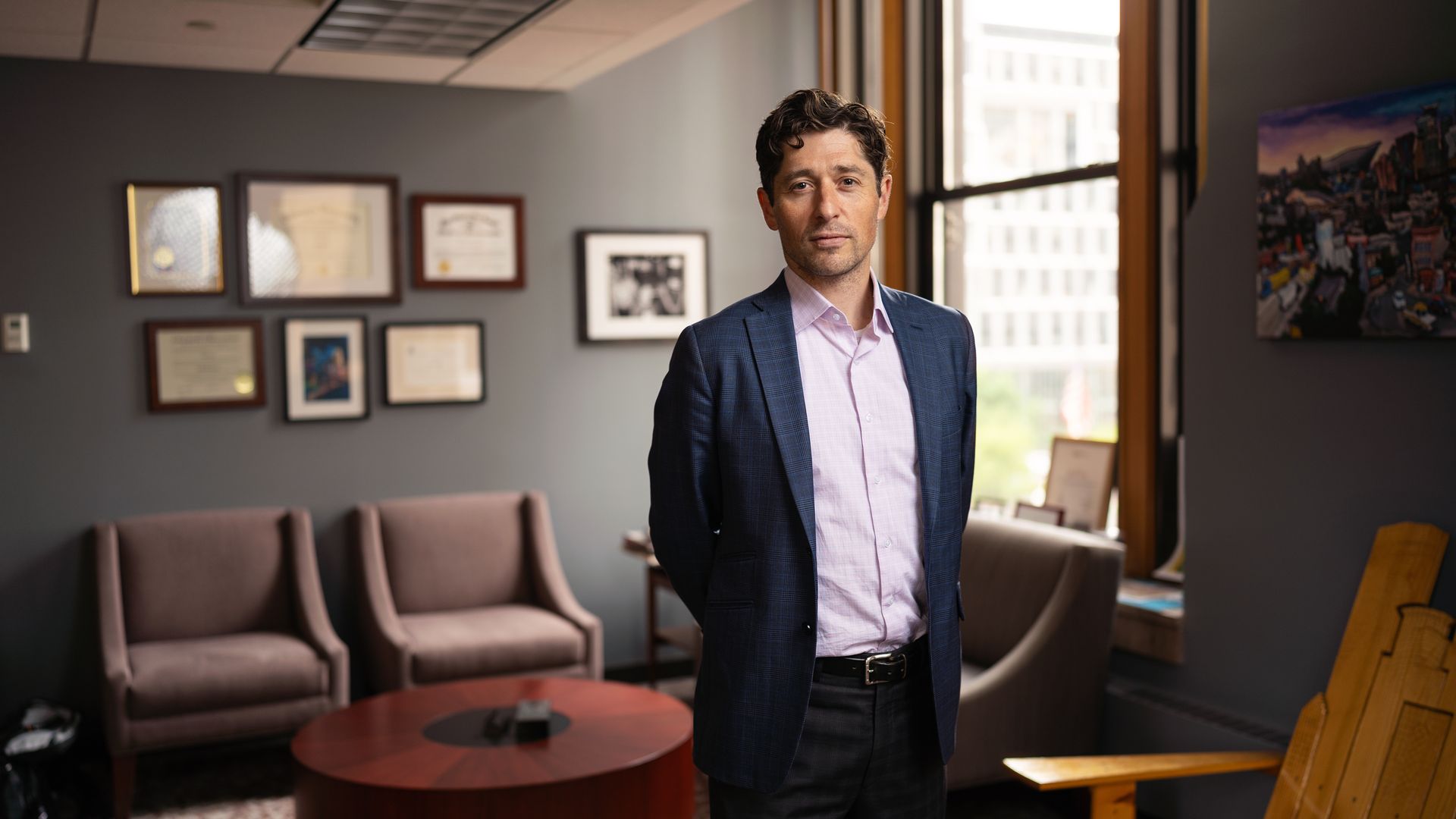 Mayor Jacob Frey standing in his office 