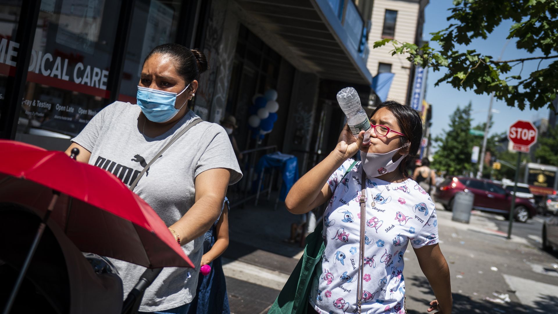 People walking in Brooklyn, New York City, on June 30.