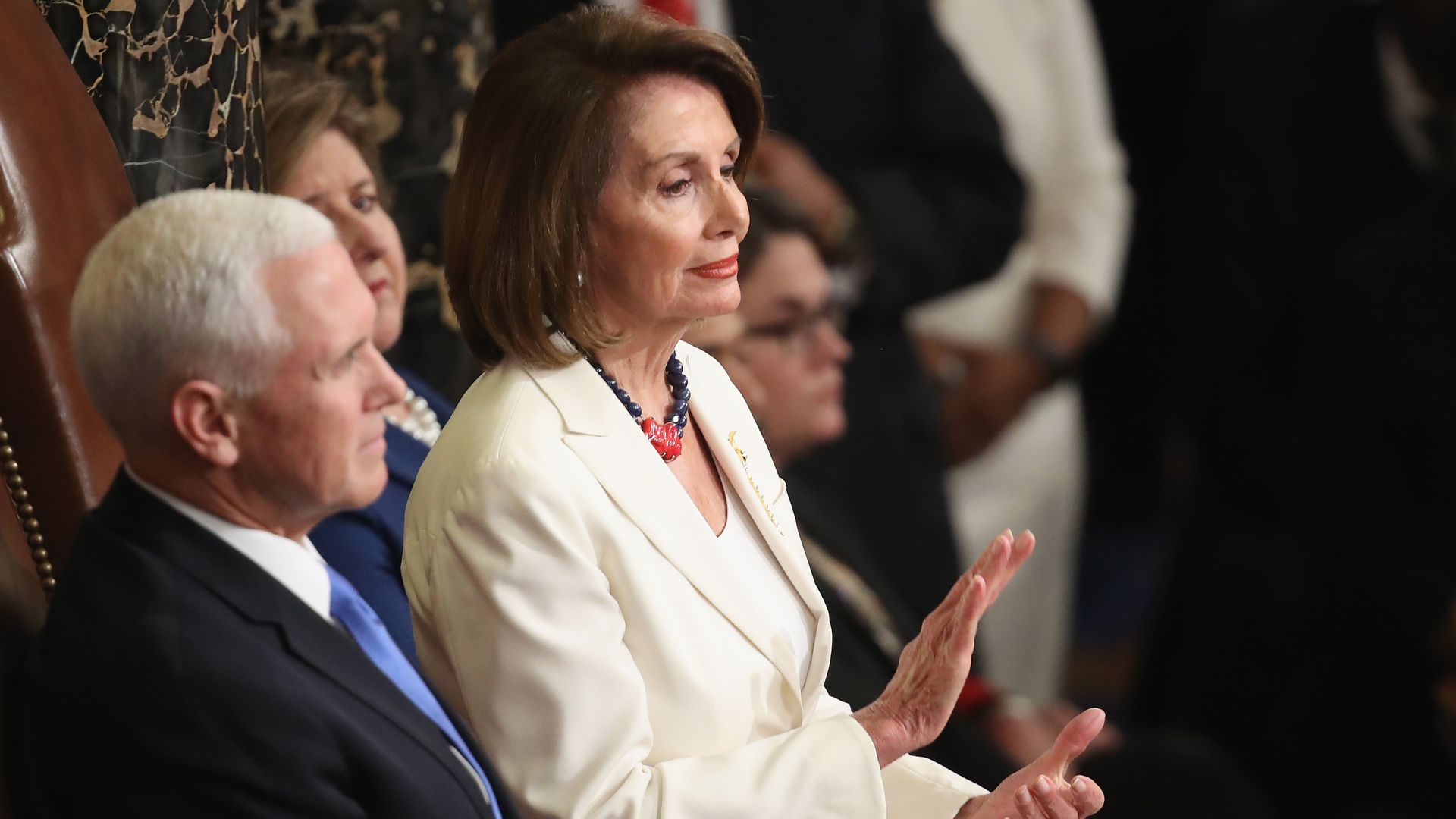 NAncy Pelosi at state of the union next to mike pence