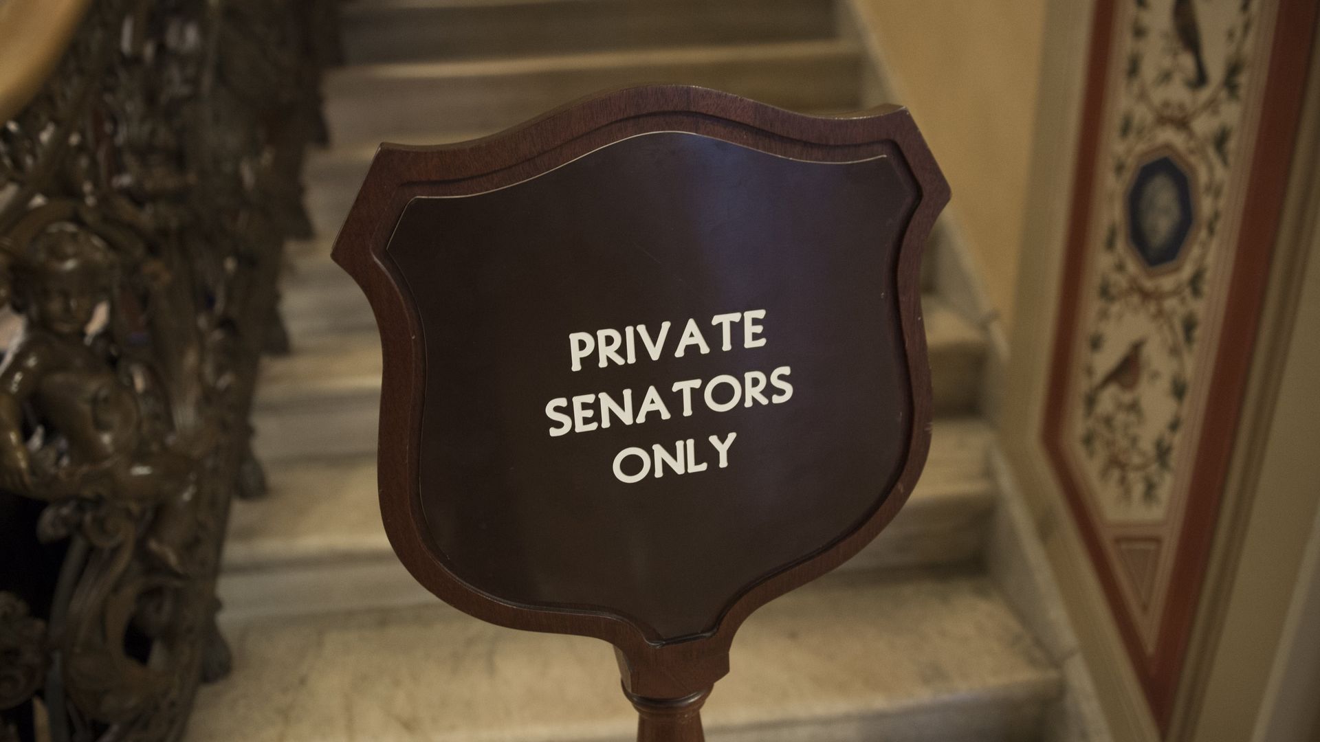 "Senators Only" sign in Capitol stairwell