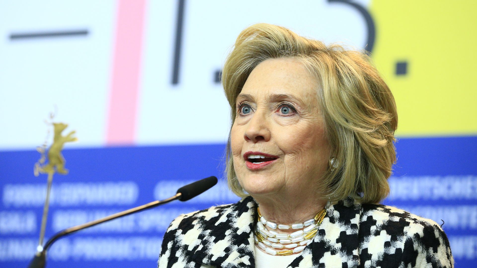 In this image, Clinton talks