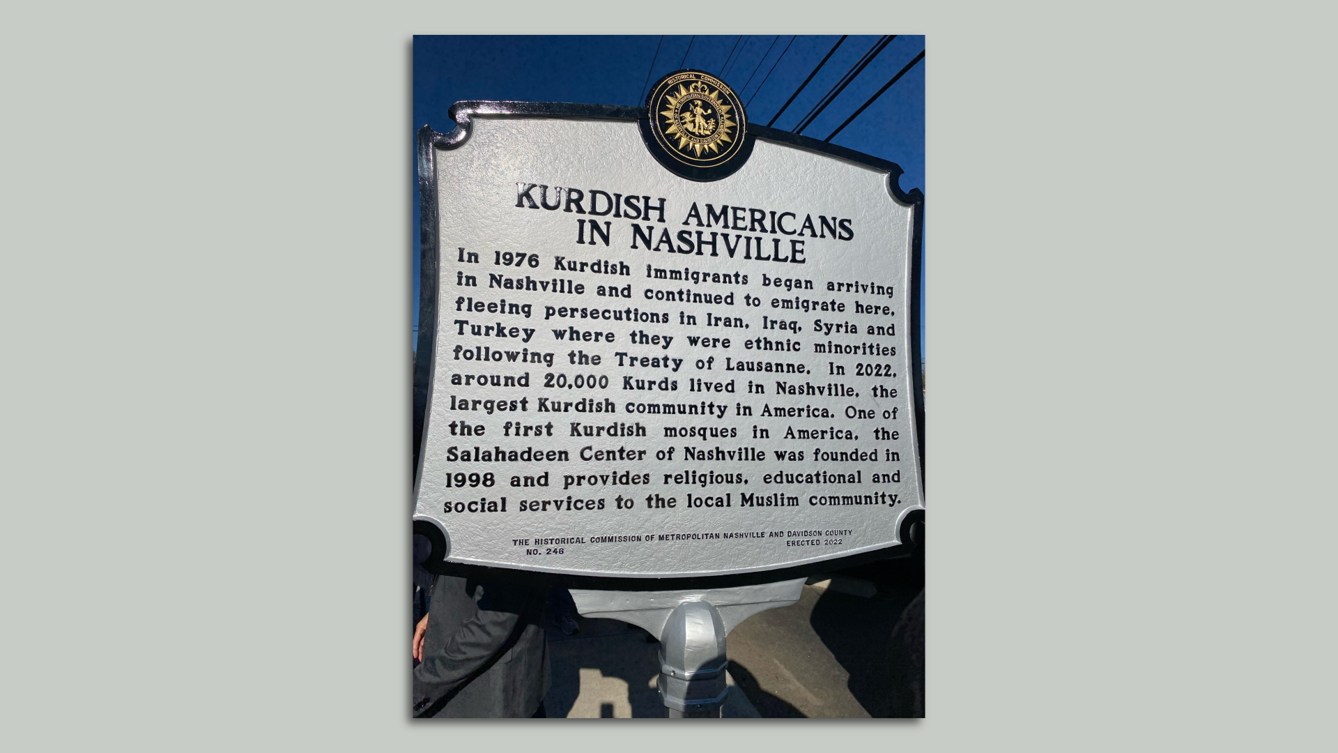 A historical marker describing how Kurdish people moved to Nashville.