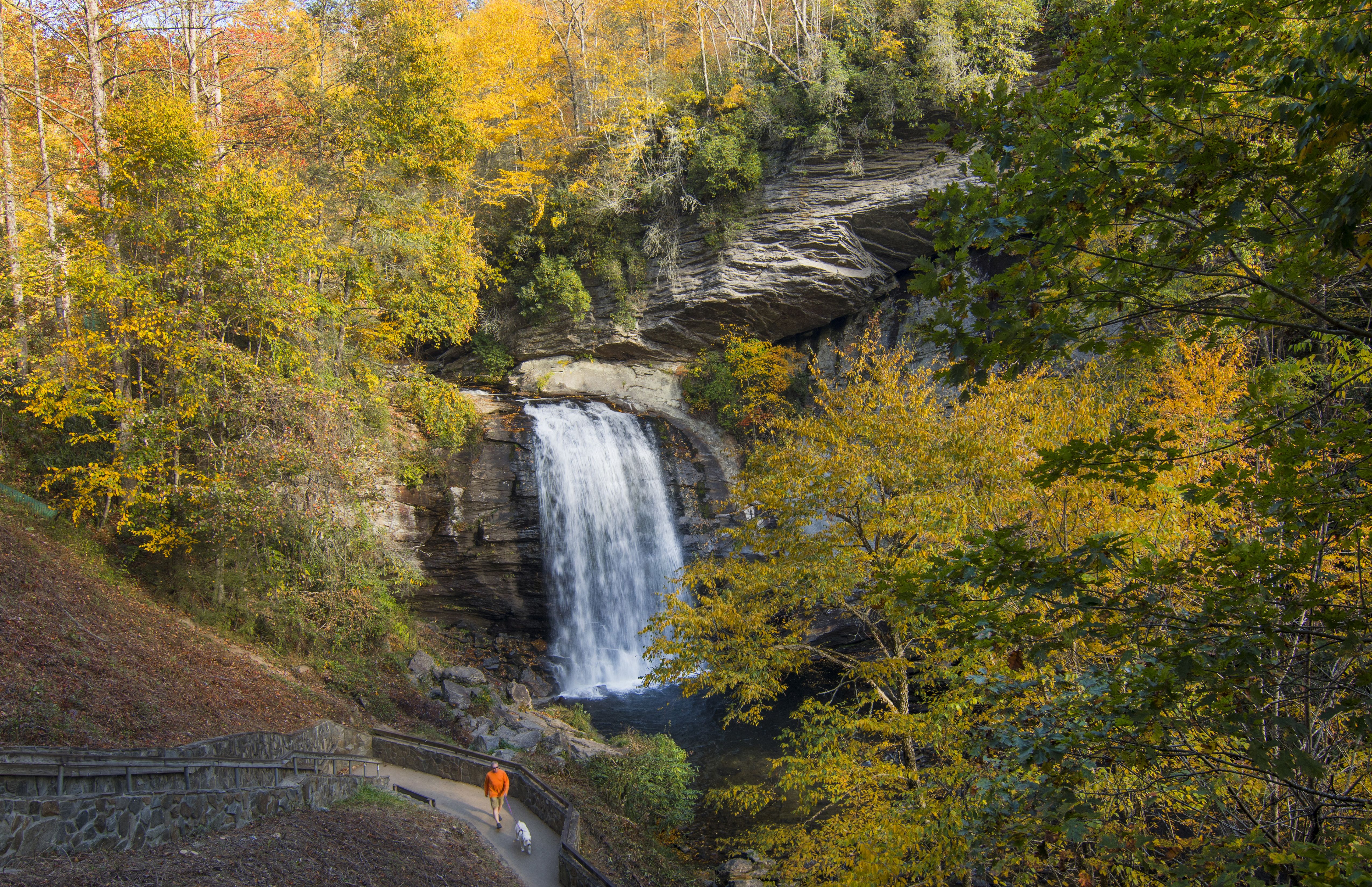 Brevard North Carolina Looking Glass Waterfall near Asheville with Fall Colors in Pisgah National Forest on Blue Ridge Parkway. (Photo by: Education Images/Universal Images Group via Getty Images)