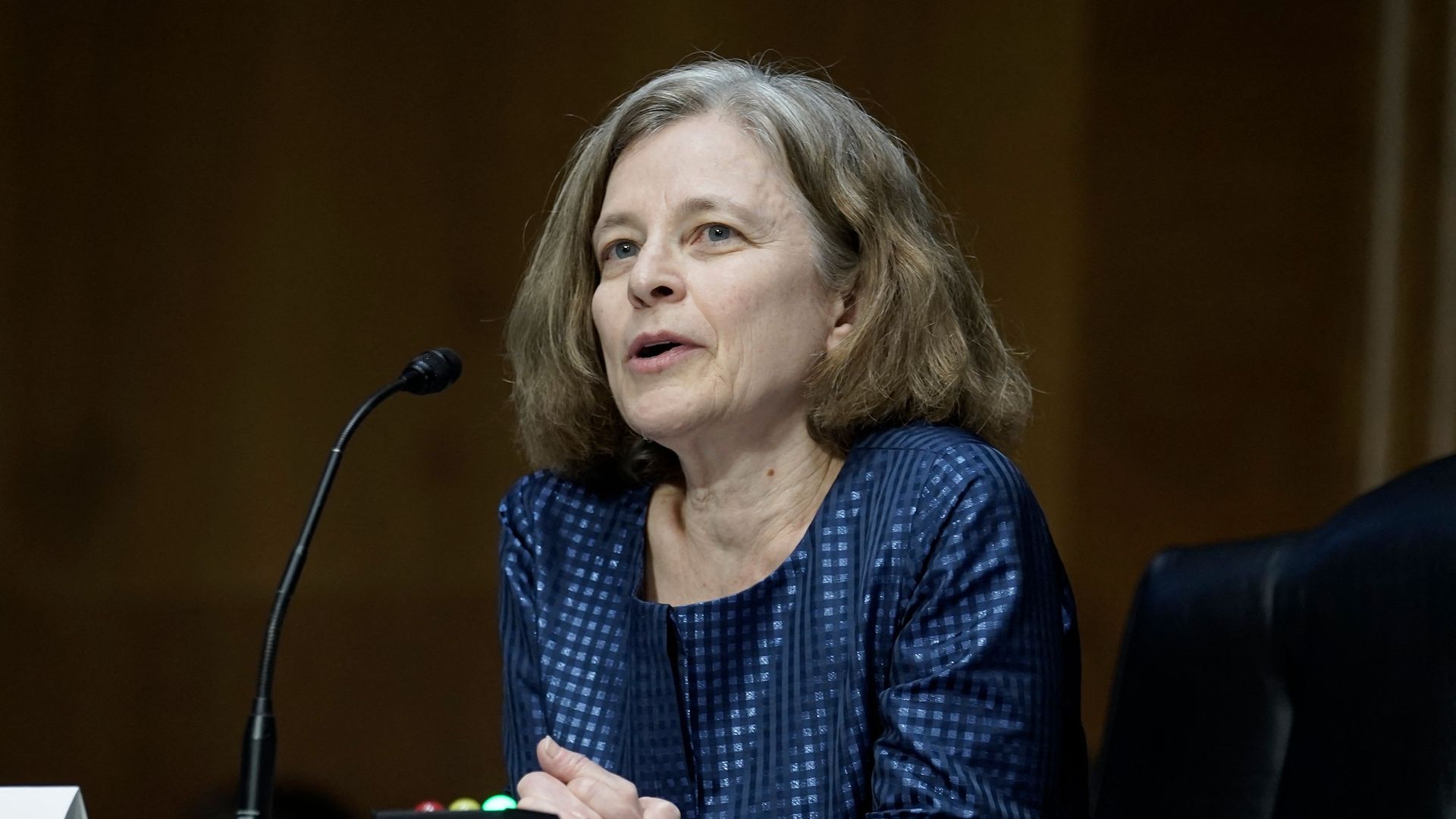 Photo of Sarah Bloom Raskin speaking into a mic