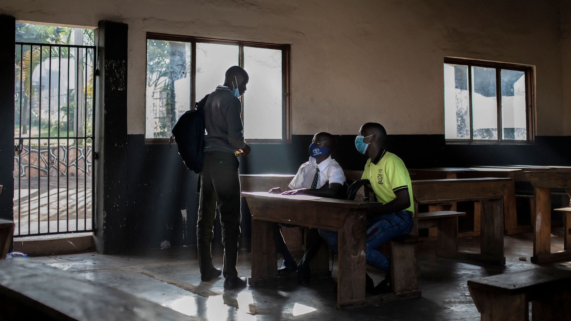 A trio of students is seen in a classroom at St, Edward High School after 