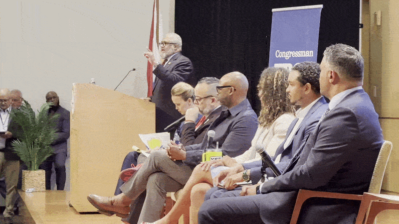Image shows Troy Carter, Mayor Helena Moreno, JP Morrell, Jason Williams, Alanah Odoms, Jared Evans and Sidney Barthelemy talking on stage.