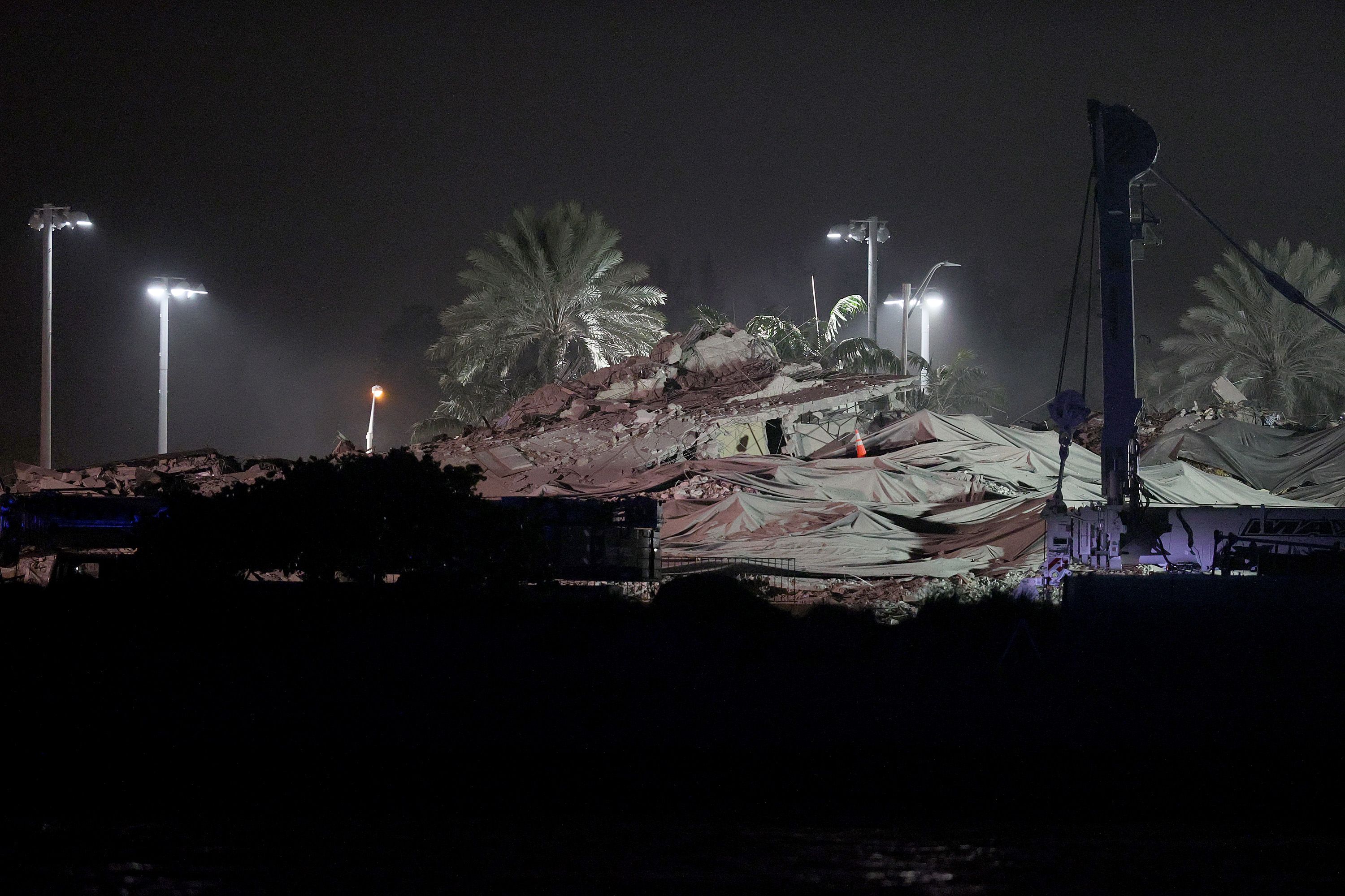  A pile of debris remains after the partially collapsed 12-story Champlain Towers South condo was taken down with a controlled demolition on July 4, 2021 in Surfside, Florida. 