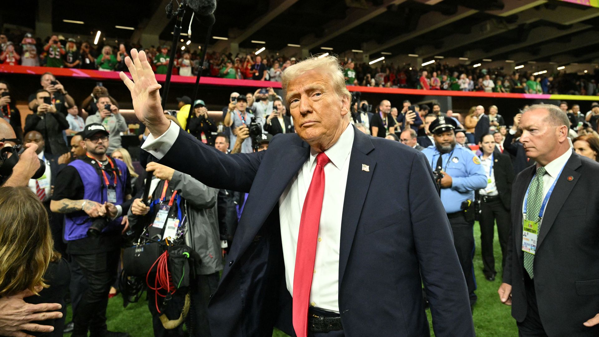 Photo shows Trump waving.