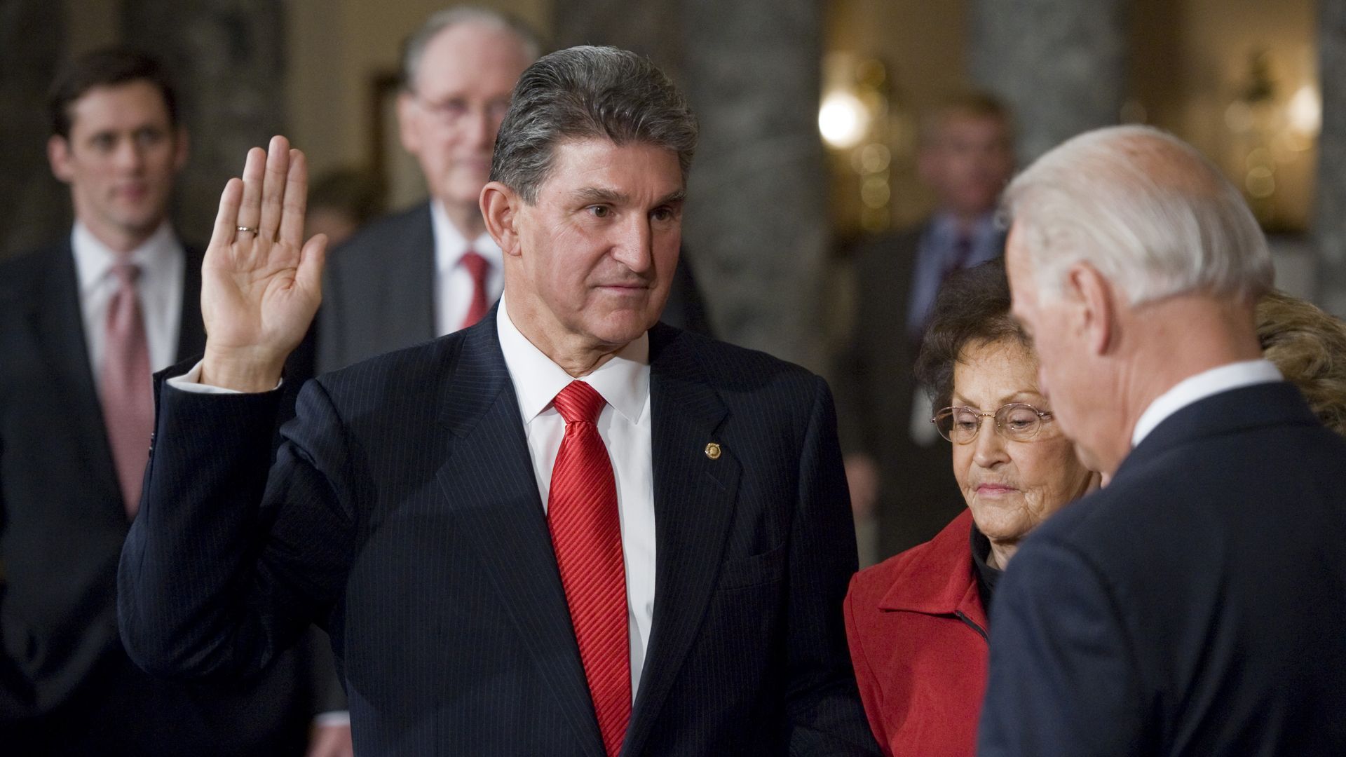 Then-Vice President Biden is seen swearing Joe Manchin into the U.S. Senate in 2010.