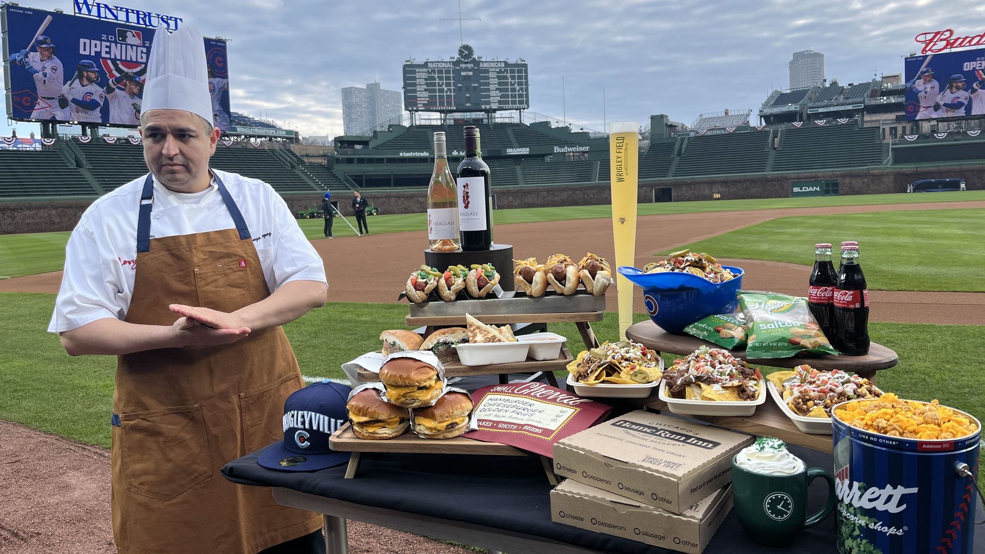 chef near food on baseball field 