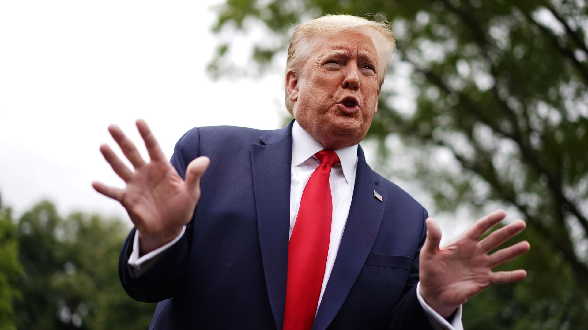 US President Donald Trump speaks to the press as he departs the White House in Washington, DC, on May 21