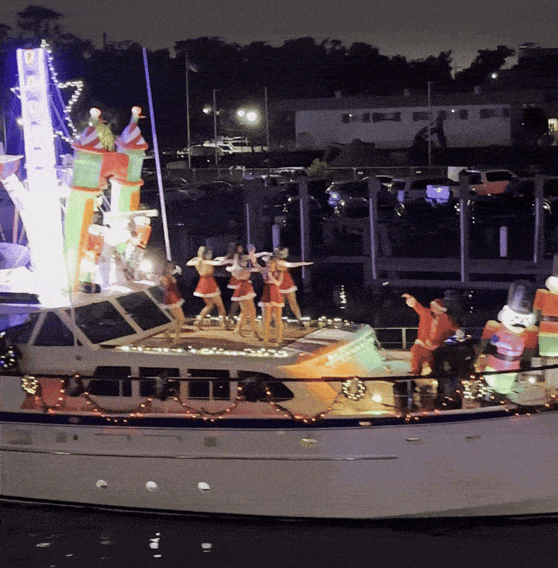 Photo shows women dancing on a boat.