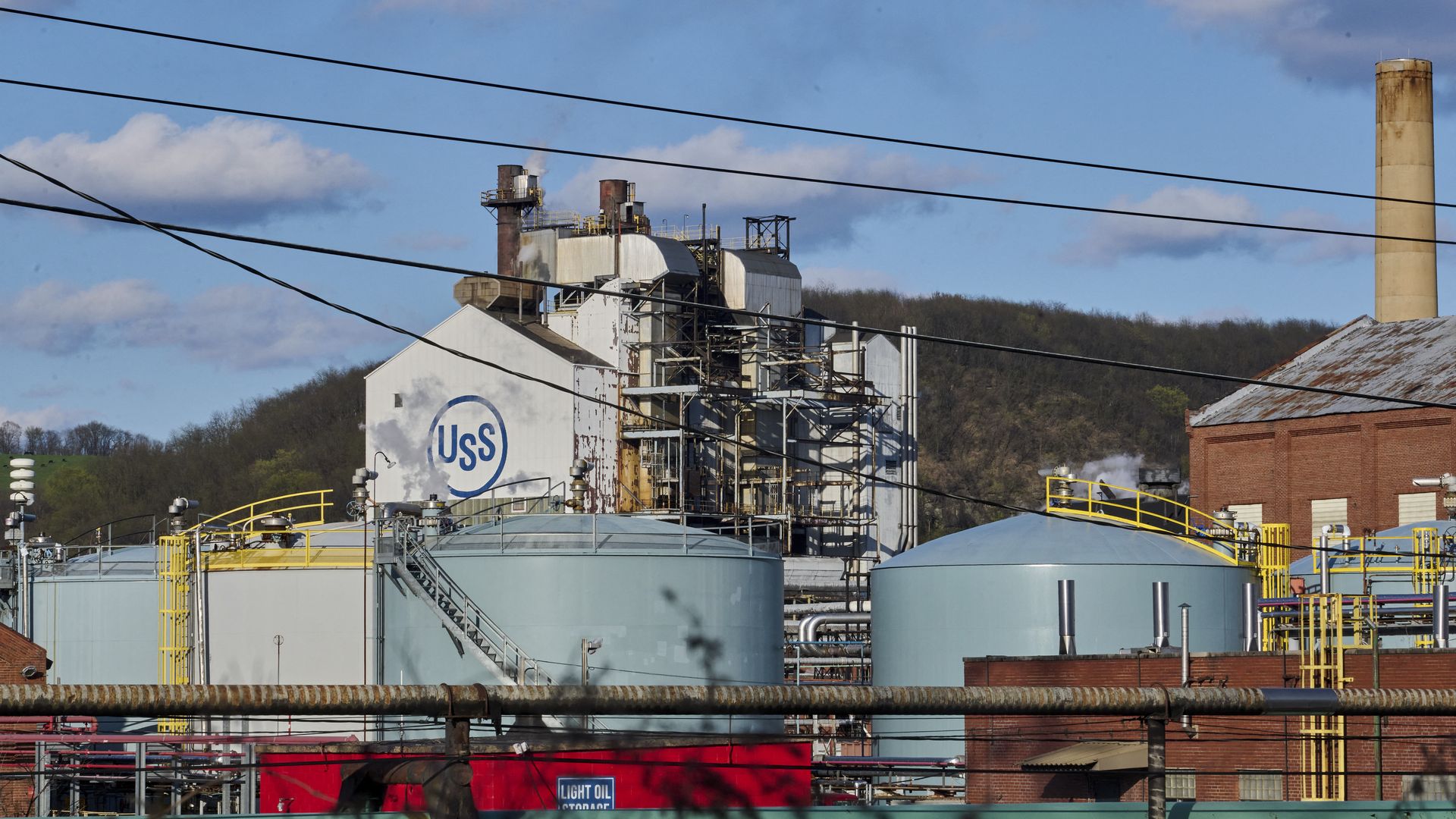 An aging factory with a smokestack