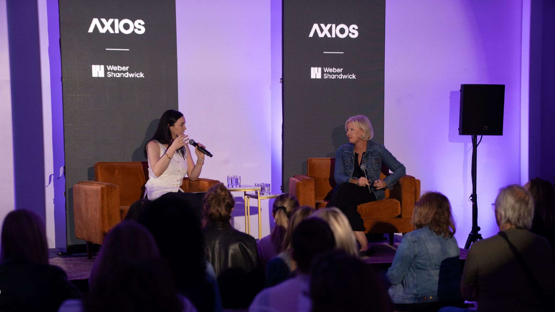 Photo of Eleanor Hawkins and Margaret Richardson on stage at SXSW Axios House