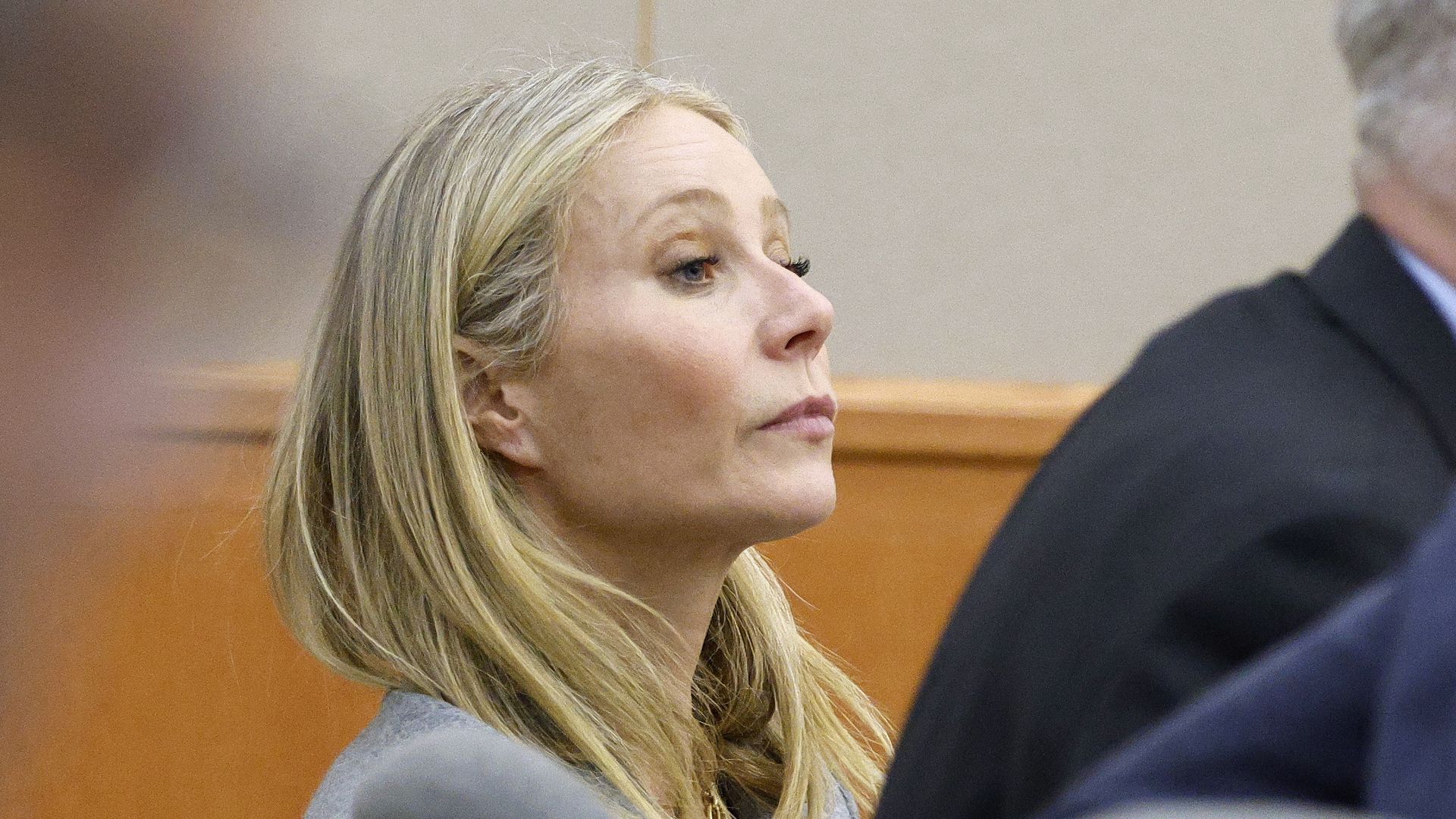 Actress Gwyneth Paltrow looks ahead in a court room. 