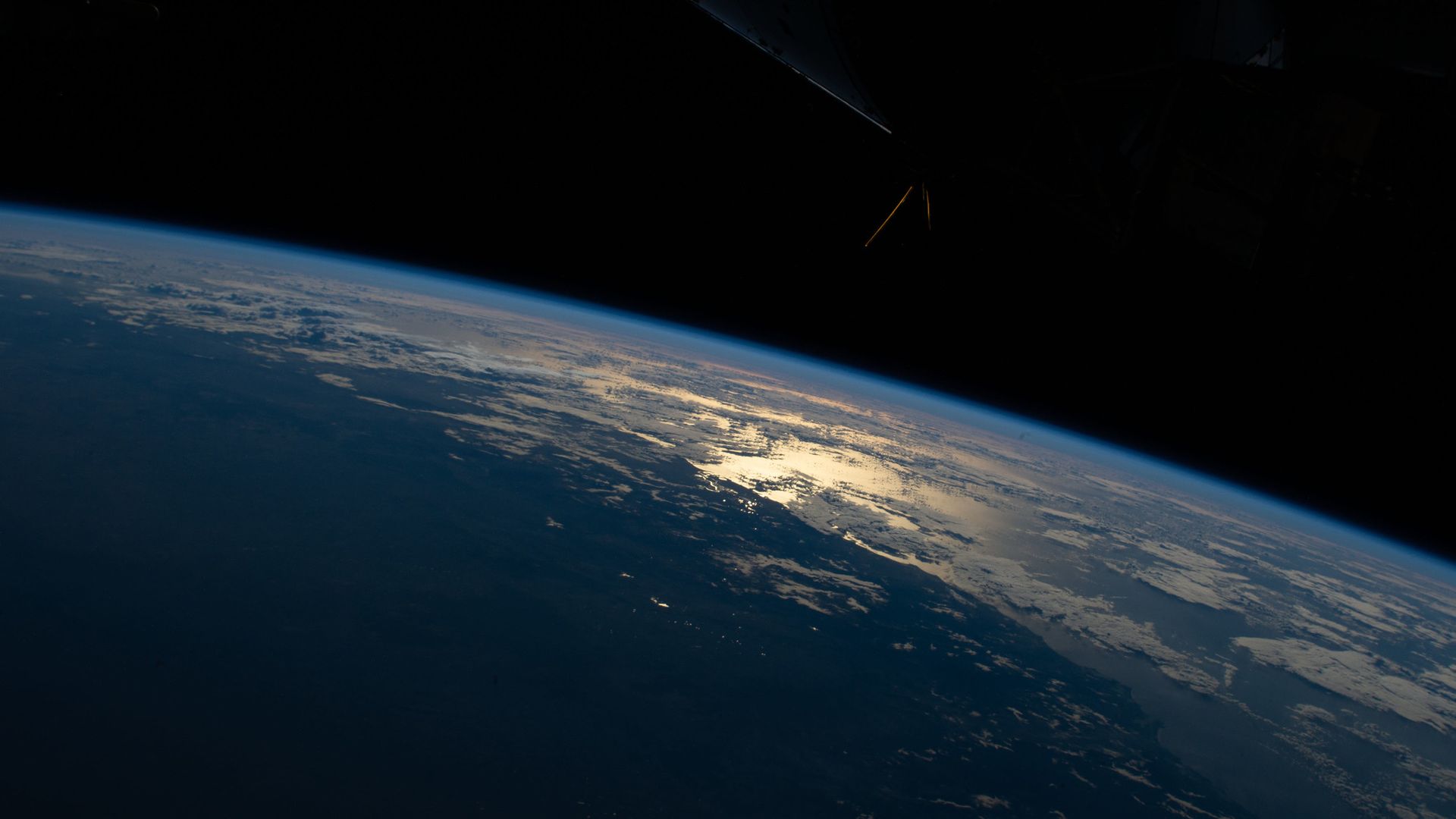 The glint of the Sun shining off the Tasman sea seen from space