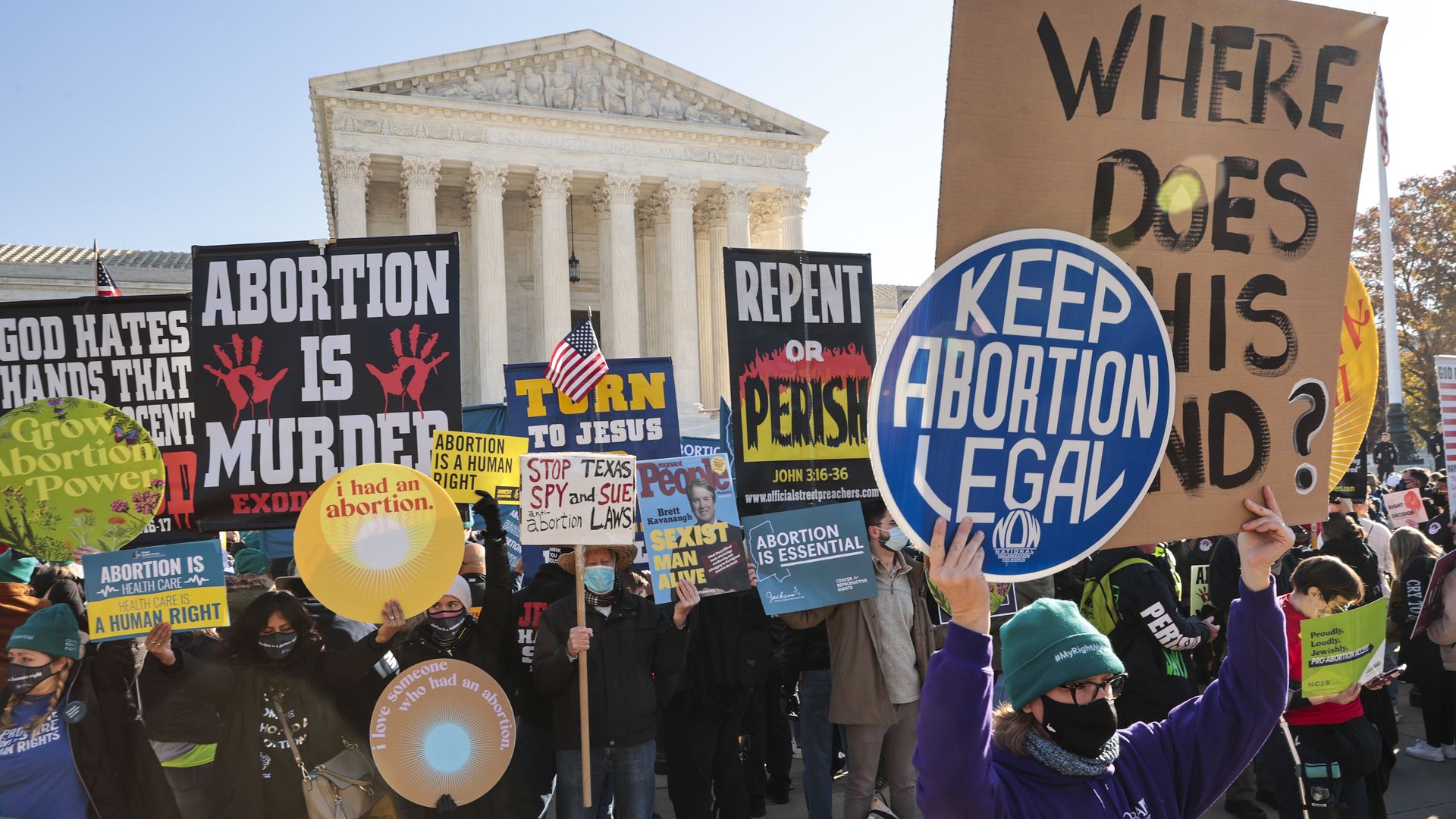 Protesters in front of the Supreme Court before oral arguments in Dobbs v. Jackson Women's Health last year.