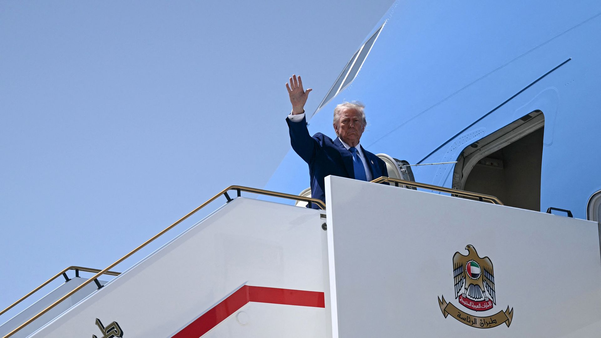 President Trump boards a plane as he ends his Middle East tour on May 16, 2025.