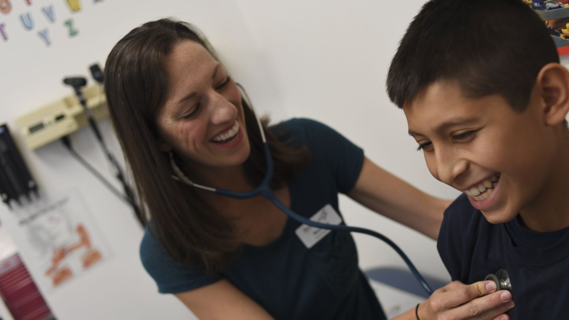 Nurse Practitioner doing a heath checkup in Denver, Colorado