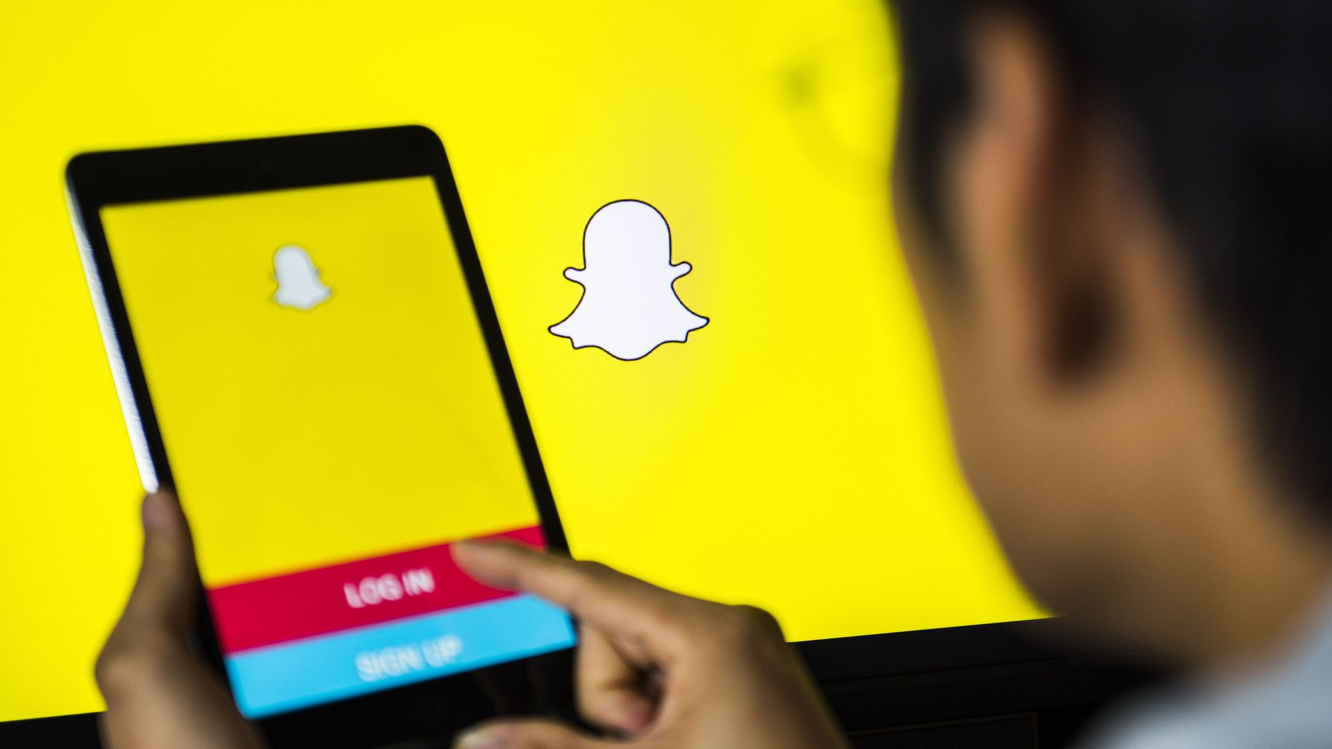 A man using Snapchat