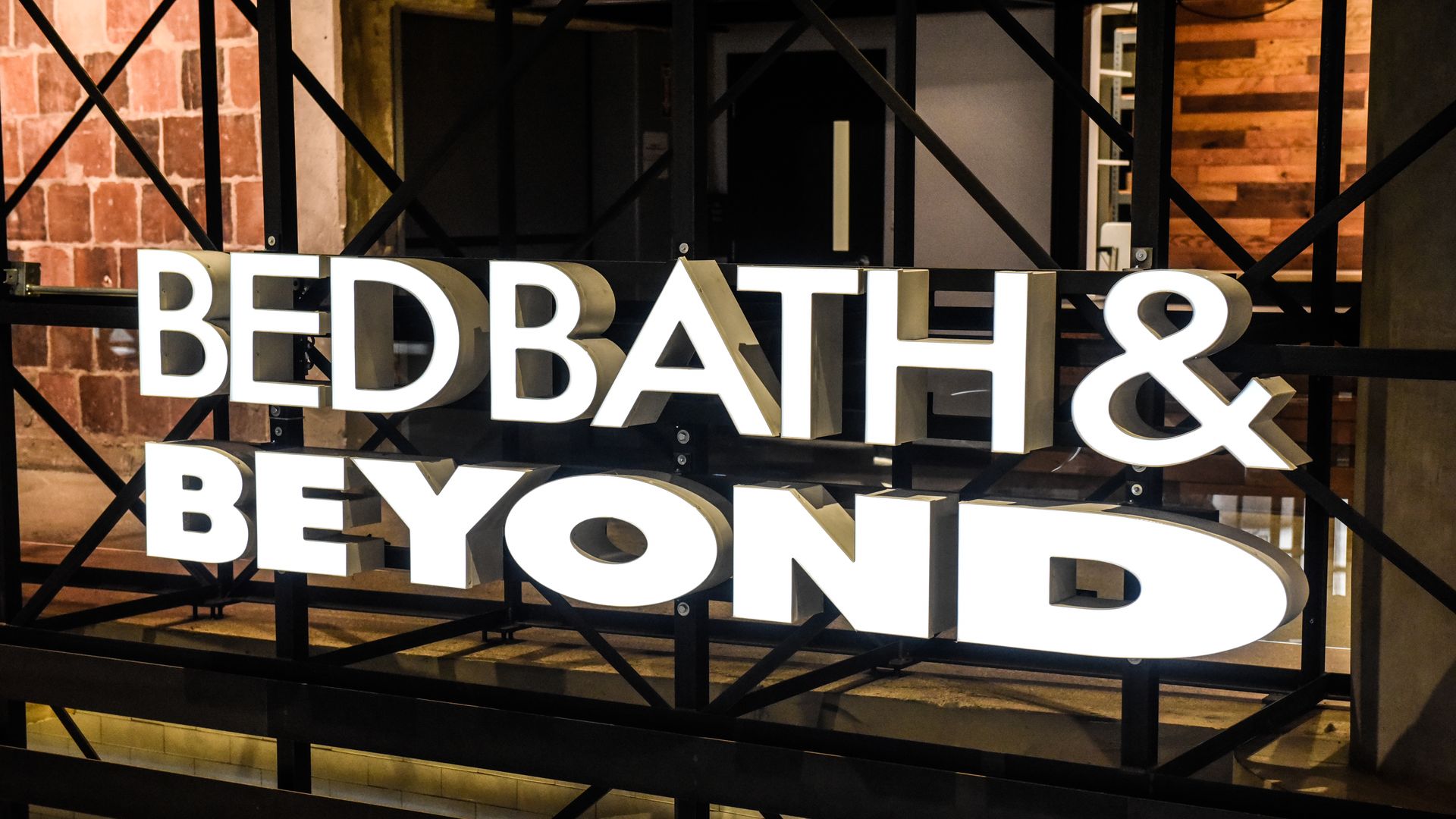 A Bed Bath & Beyond store sign in white lettering.