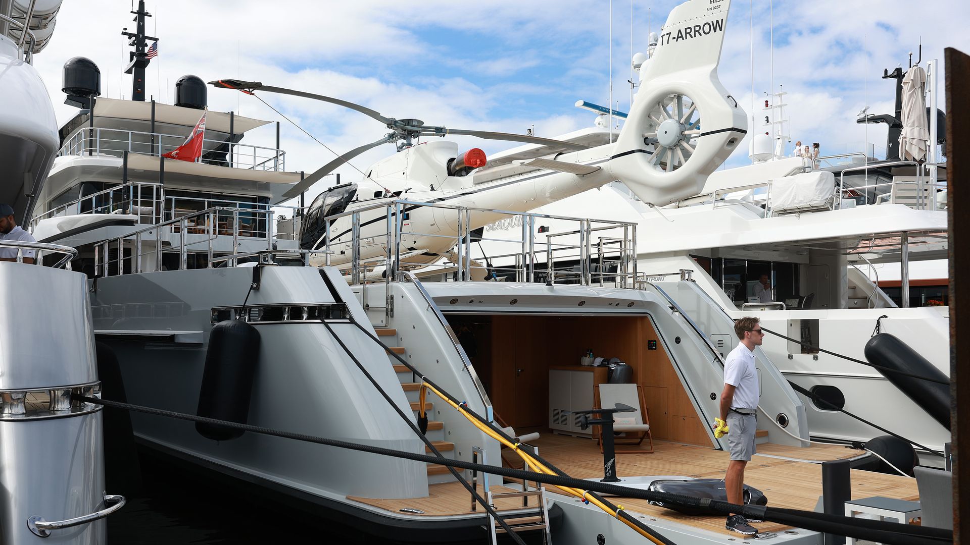 A helicopter sits on the deck of a HMY Yacht on display at the 64th Fort Lauderdale International Boat Show on October 25, 2023 in Fort Lauderdale, Florida.