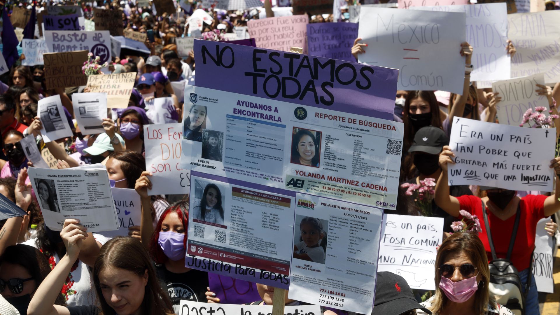 A protest sign with print-outs of missing women reports in Mexico City, April 24. Photo: Luis Barrón/Eyepix Group/Future Publishing via Getty Images