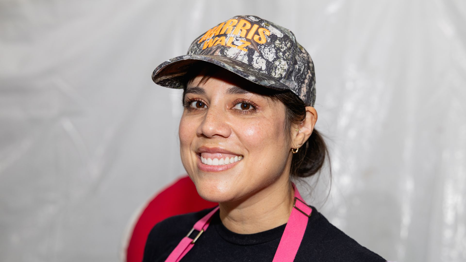 Jennifer Dobbertin smiles at the camera during a culinary event. 