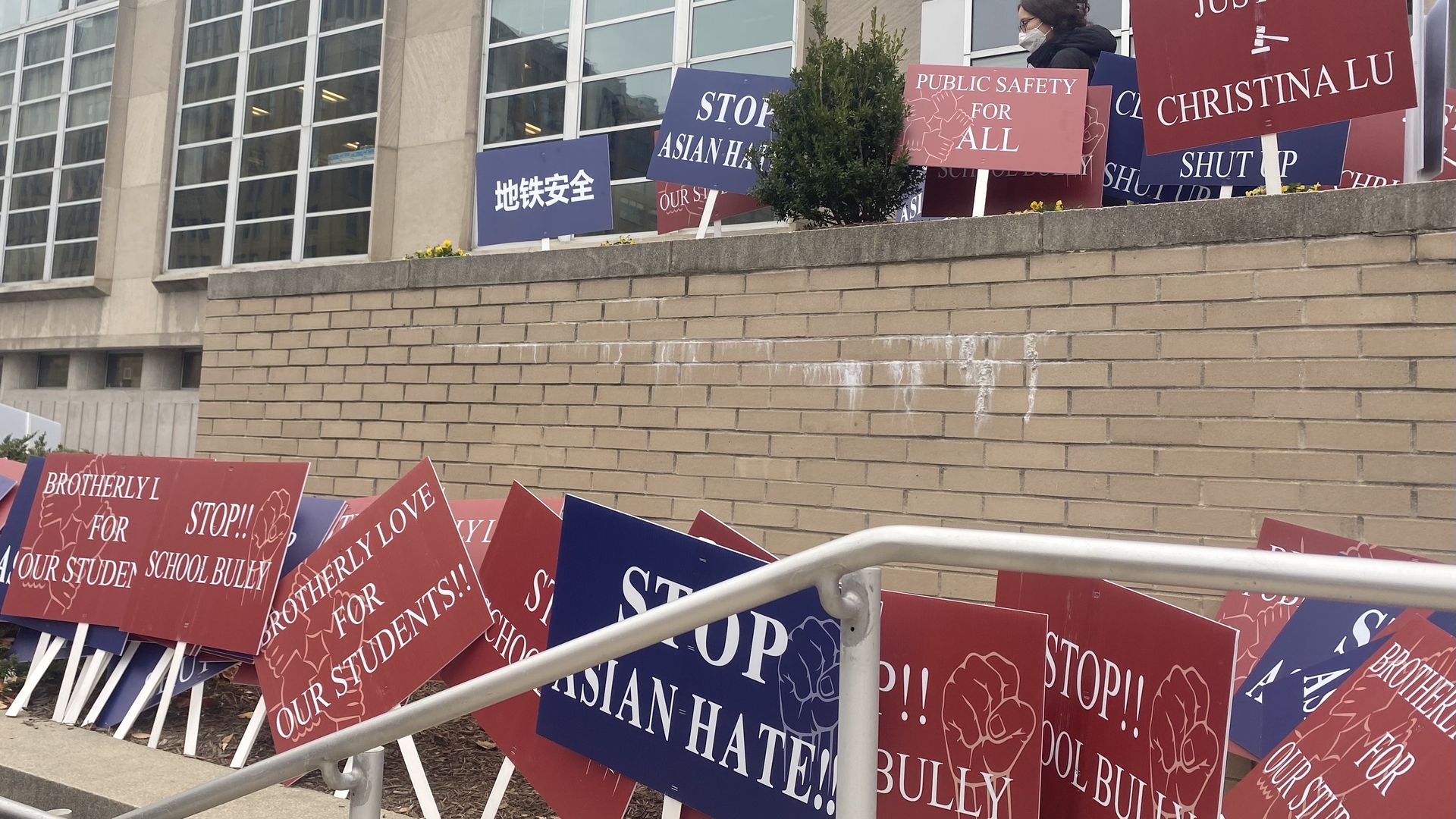 Supporters' signs at a rally against Asian hate in Philadelphia