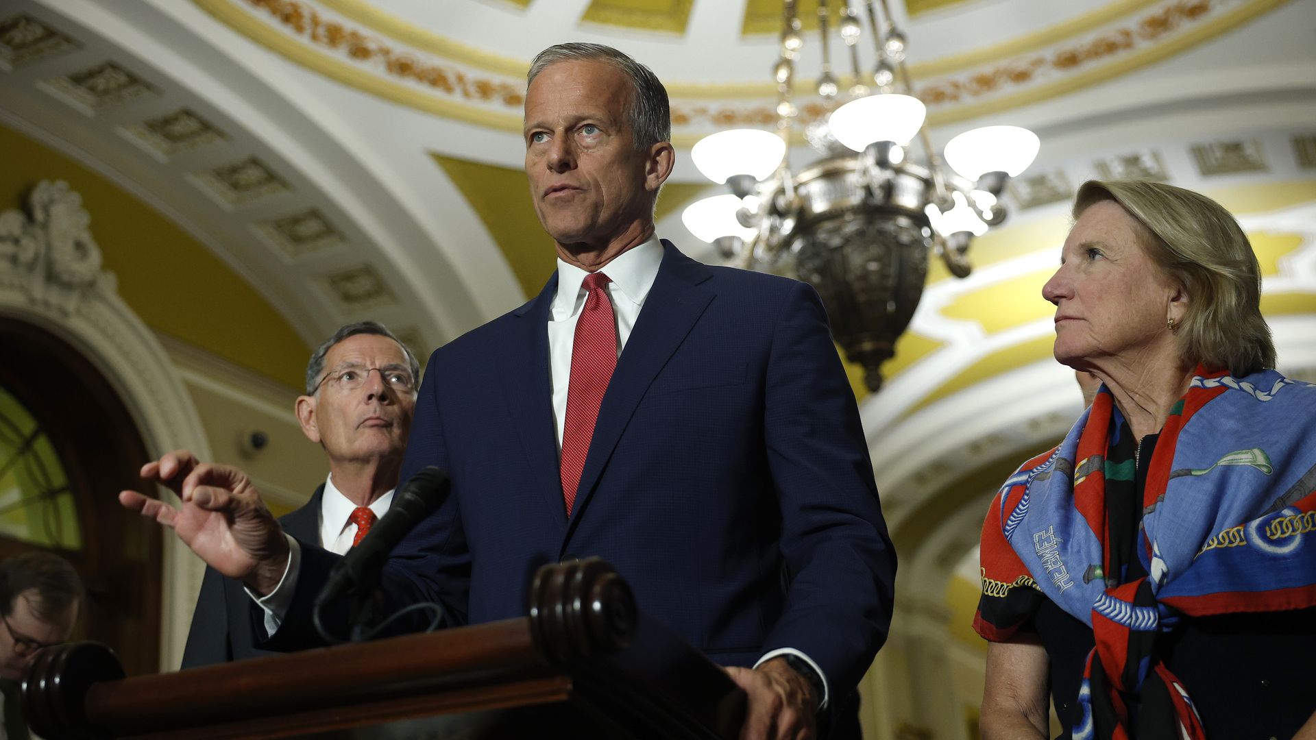 Senate Majority Leader John Thune (R-SD), joined by Sen. John Barrasso (R-WY) and Sen. Shelley Moore Capito (R-WV), speaks to the media following a Senate policy luncheon at the U.S. Capitol