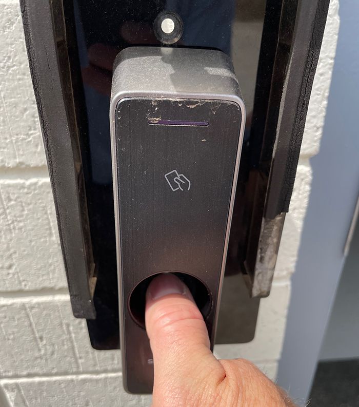 thumb scanner at cork vault wine storage