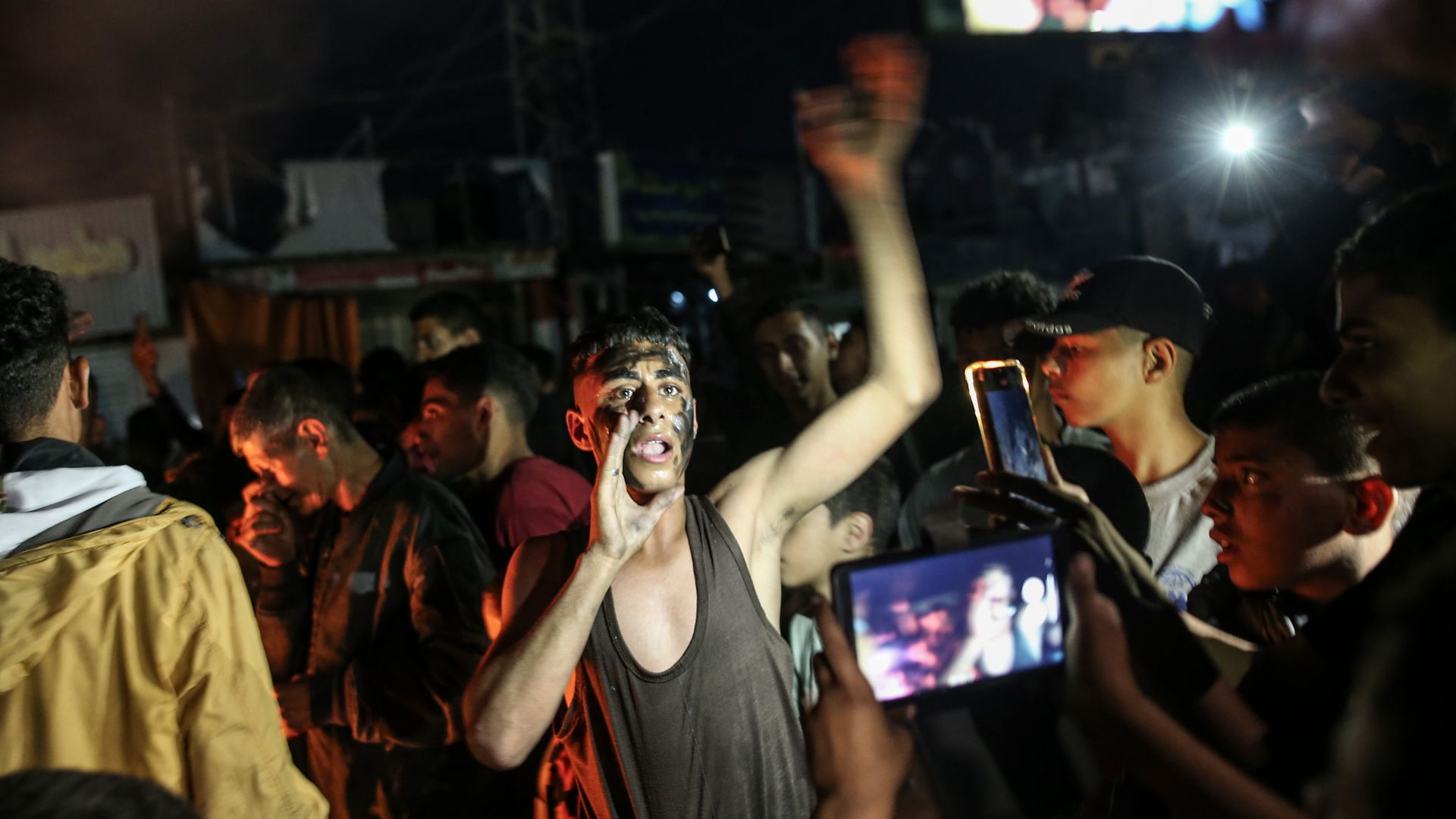 Palestinians celebrate after Hamas accepted a proposed cease-fire in Rafah, Gaza on May 06, 2024. (Photo by Jehad Alshrafi/Anadolu via Getty Images)