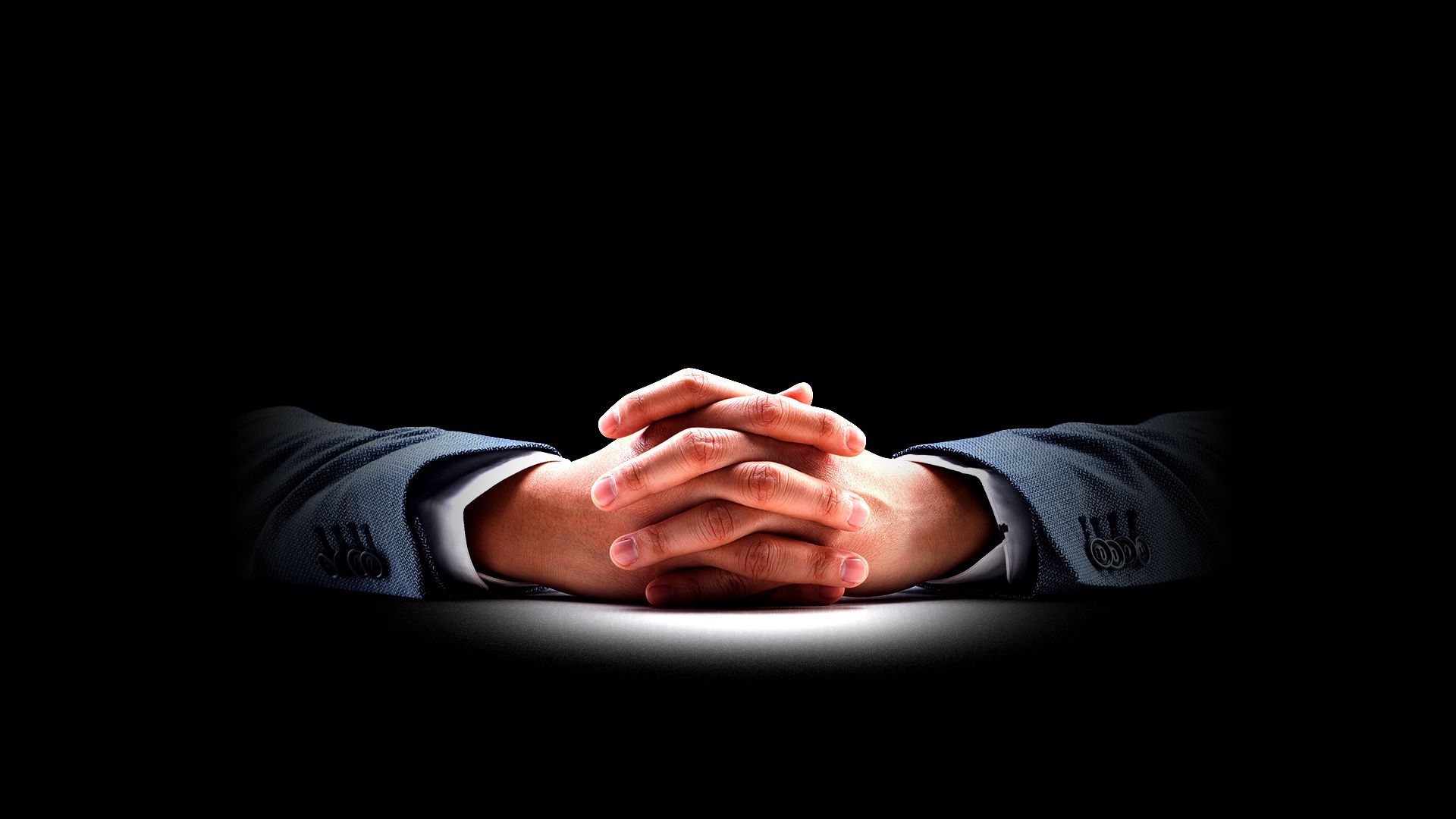 Illustration of a pair of hands coming out from the shadows. 