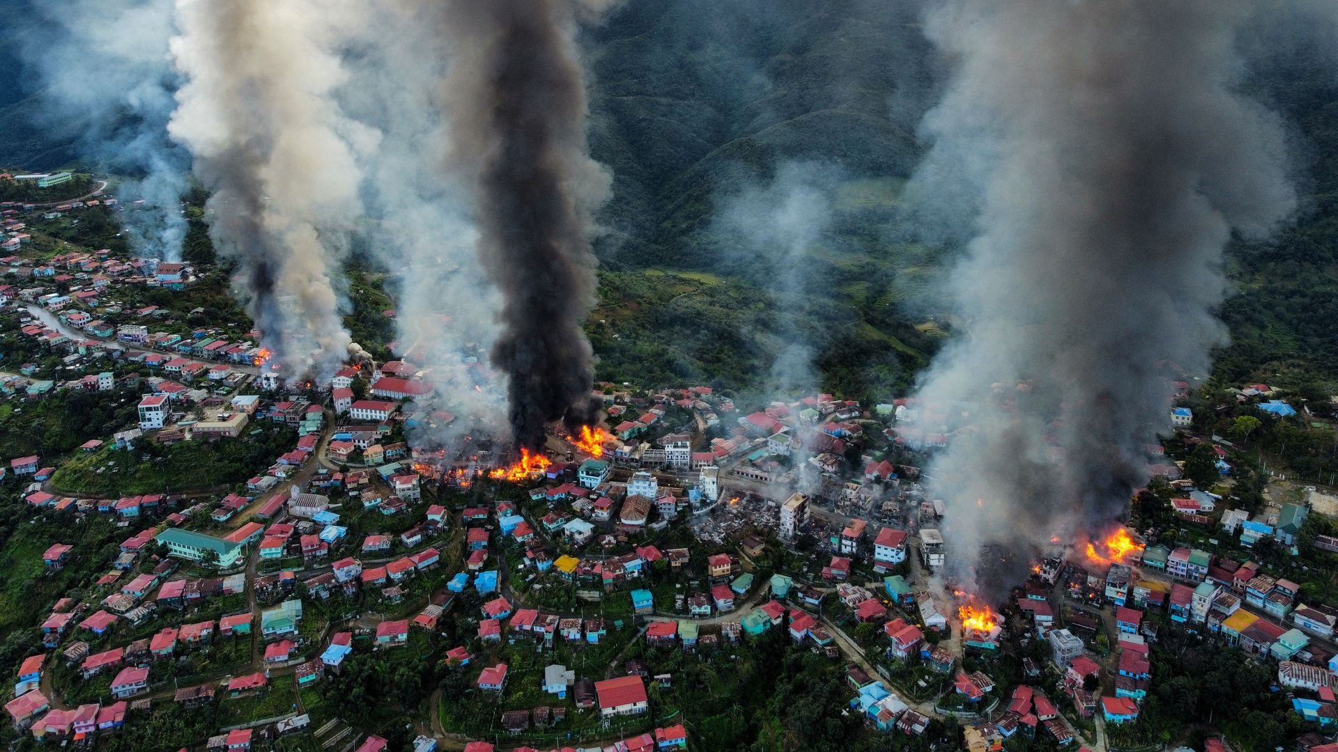  smokes and fires from Thantlang, in Chin State, where more than 160 buildings have been destroyed caused by shelling from Junta military troop