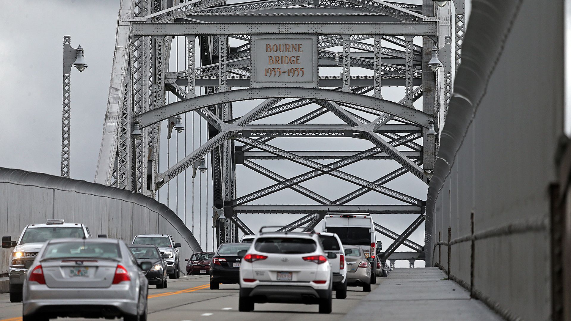 Cars and vans are crossing the Bourne Bridge to get on or off Cape Cod in Massachusetts.