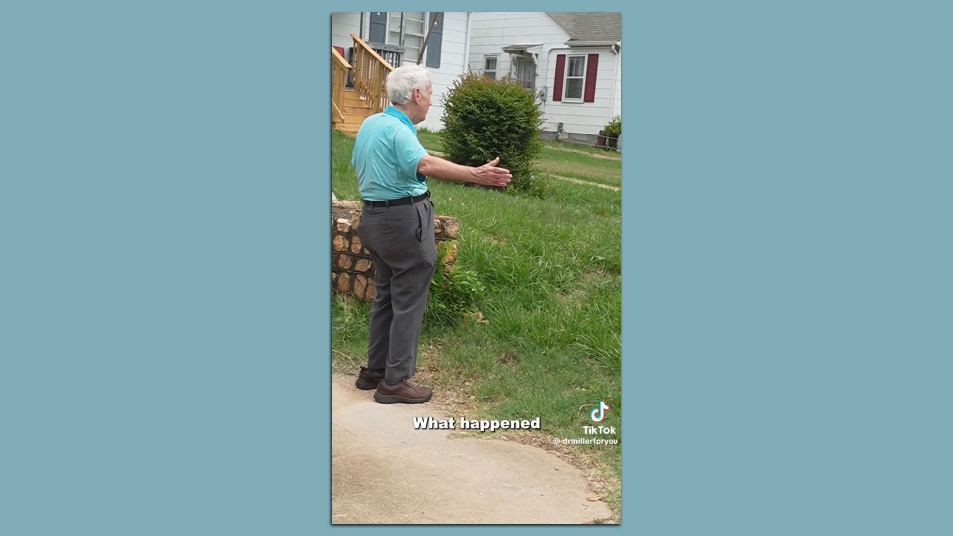 An elderly man with white hair in a light teal polo and gray pants stands on a sidewalk, reaching toward a shrub in a front yard of a white house with red shutters; caption reads "What happened".