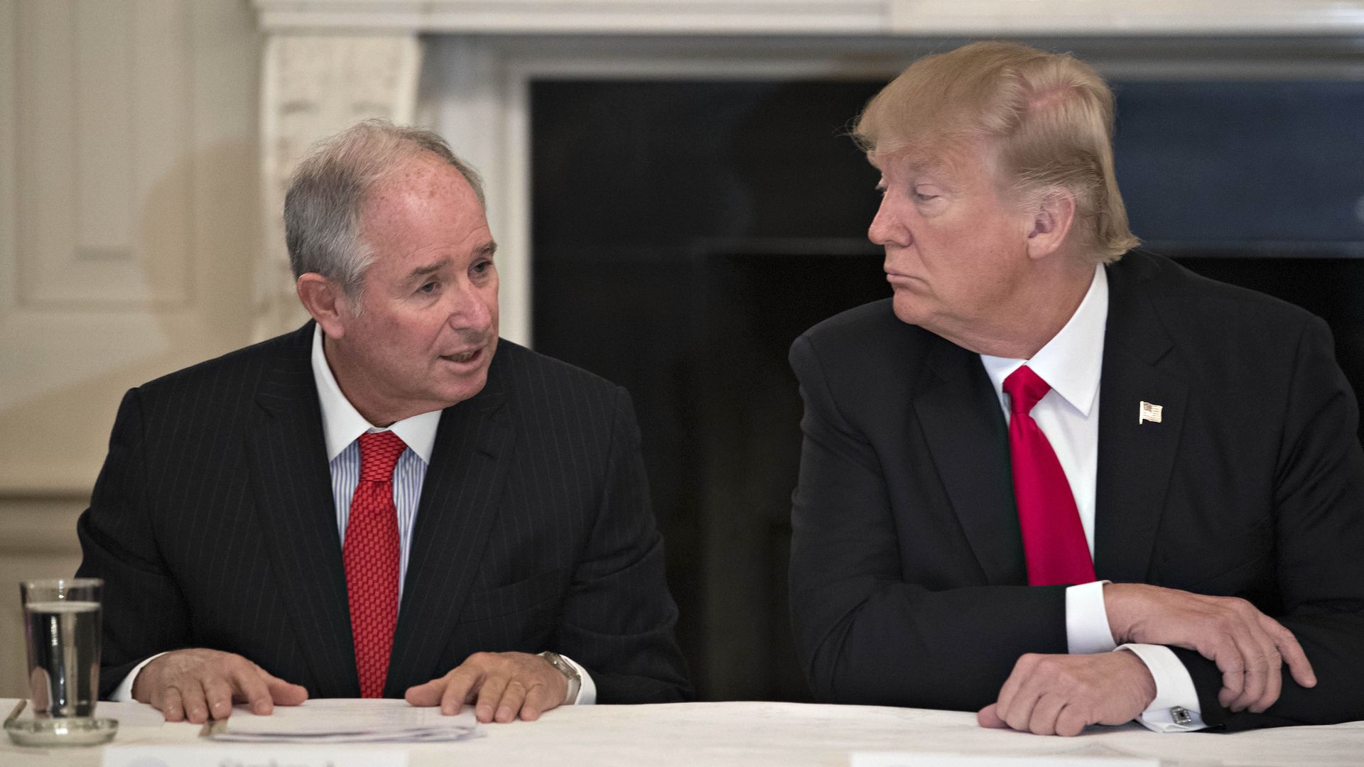 Stephen A. Schwarzman (left) speaks next to former President Trump during a 2017 meeting at the White House. Photo: Andrew Harrer/Bloomberg via Getty Images