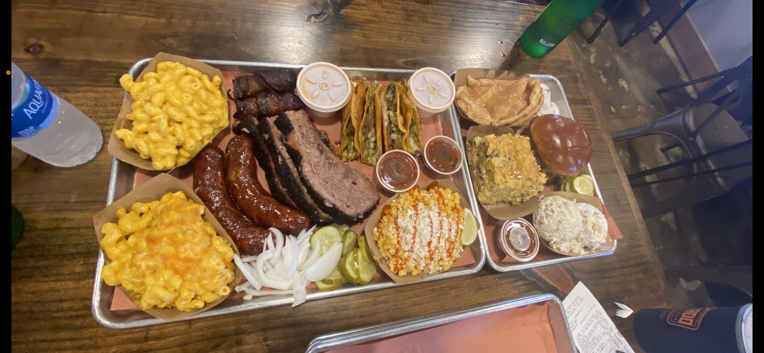 A massive tray of barbecue and sides.