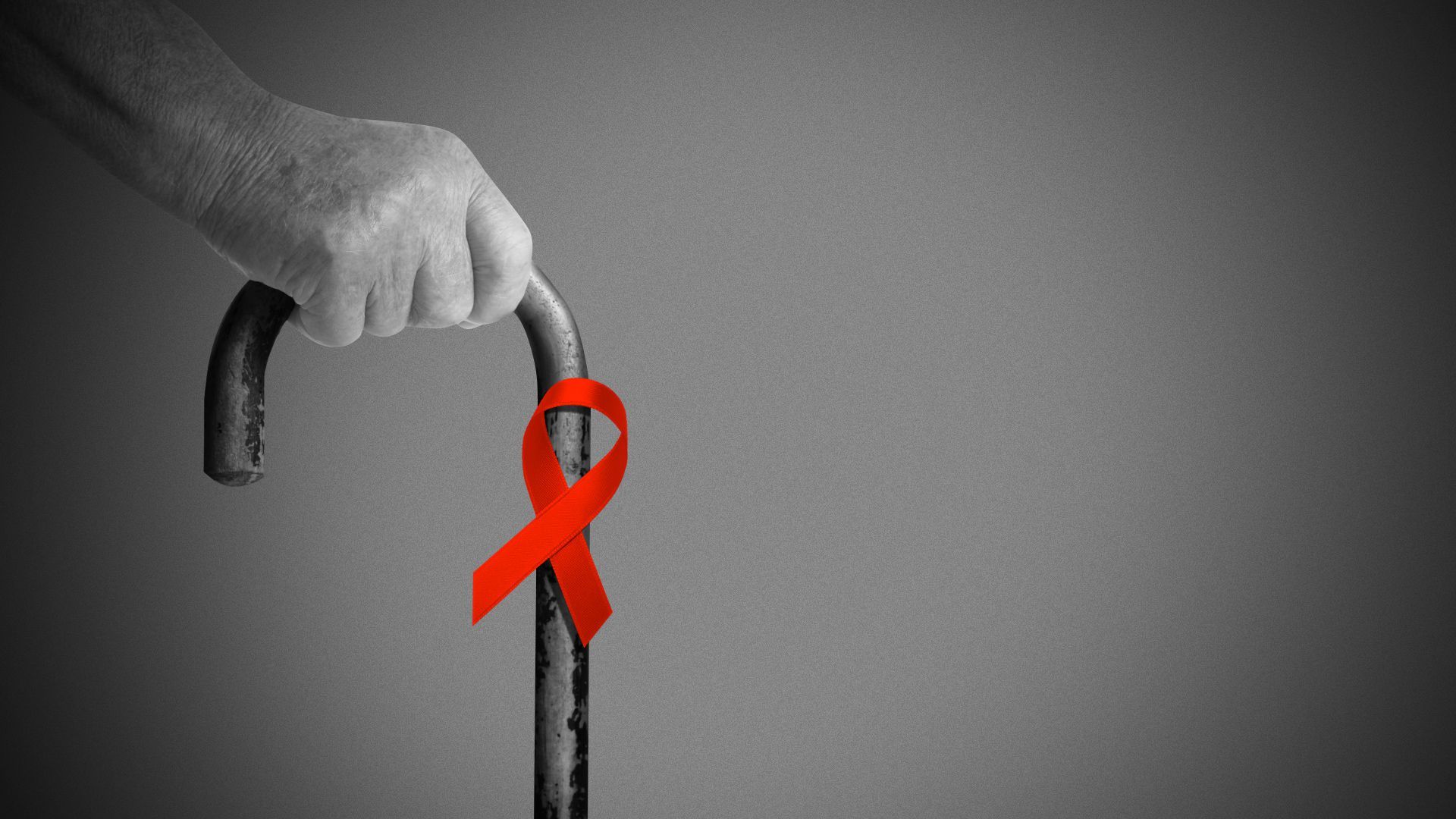 Illustration of a person with a cane that has a red HIV awareness ribbon on it.  