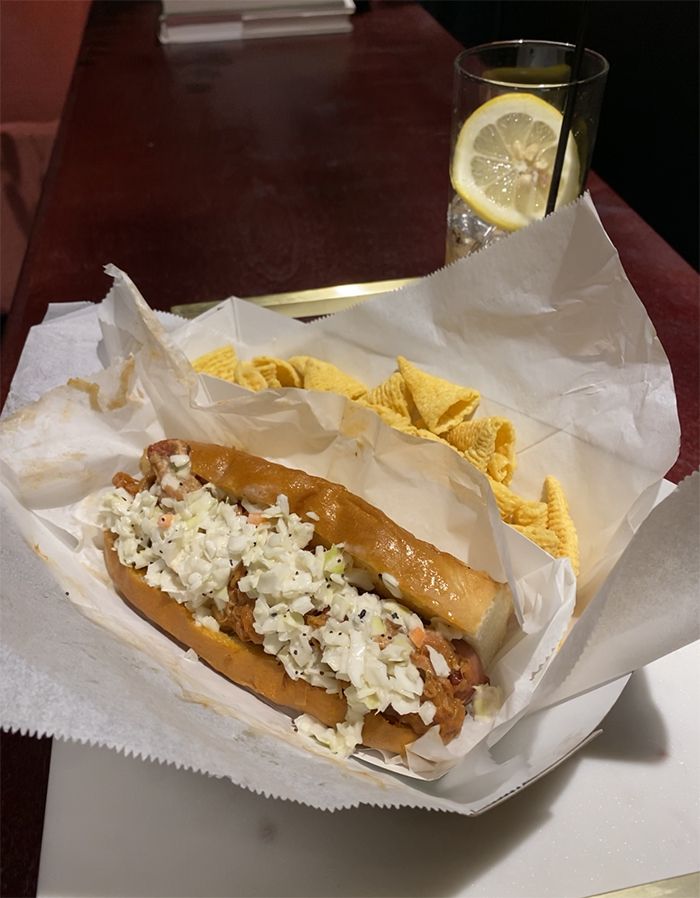 Stroke indoor mini golf now open in Plaza Midwood. BBQ hot dog