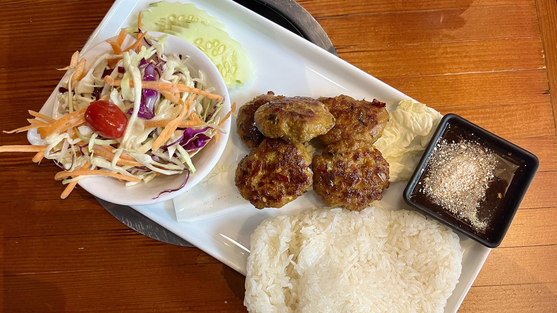 cabbage salad, meat patties and rice
