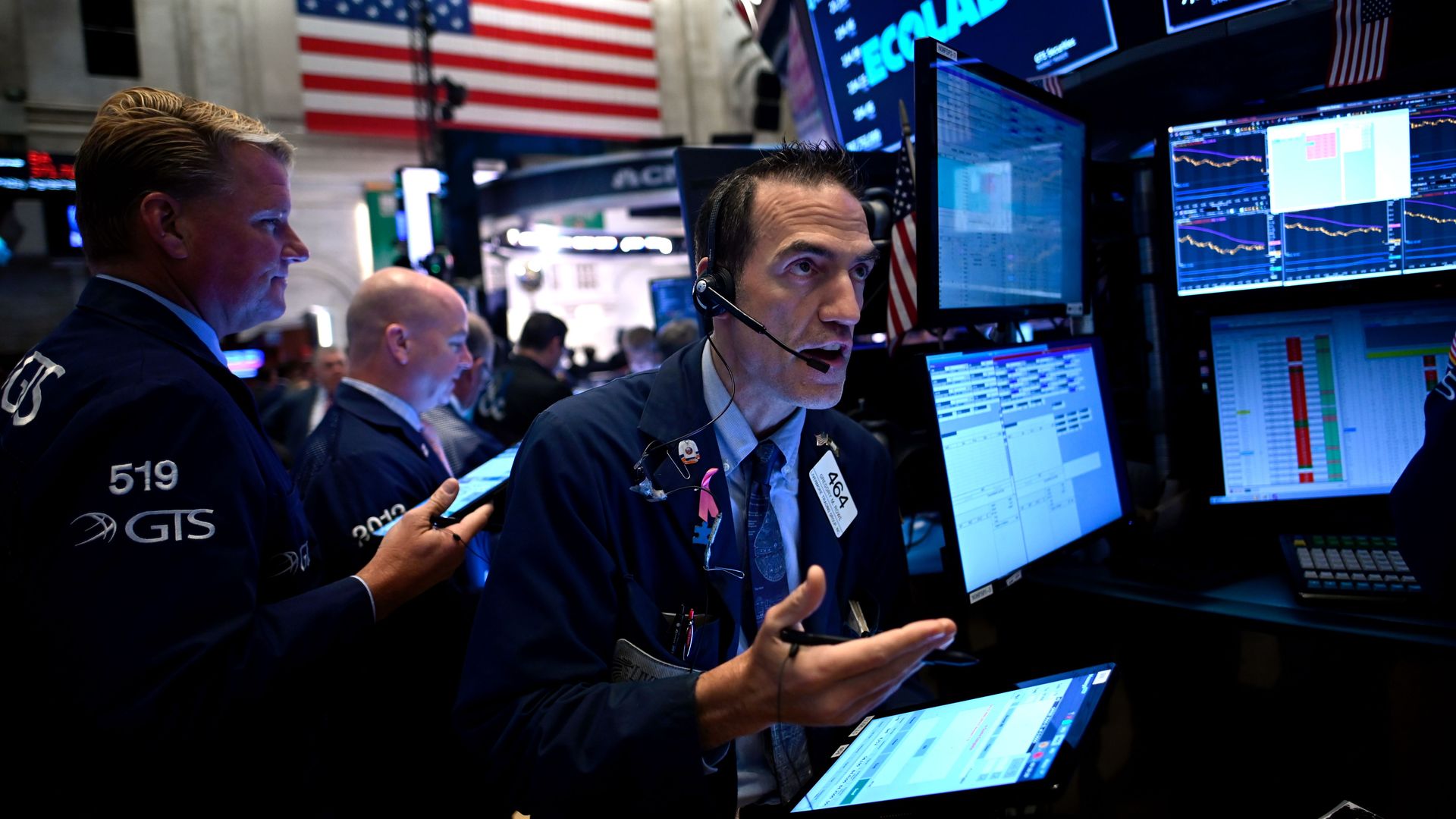  Traders work during the opening bell at the New York Stock Exchange (NYSE) on October 2