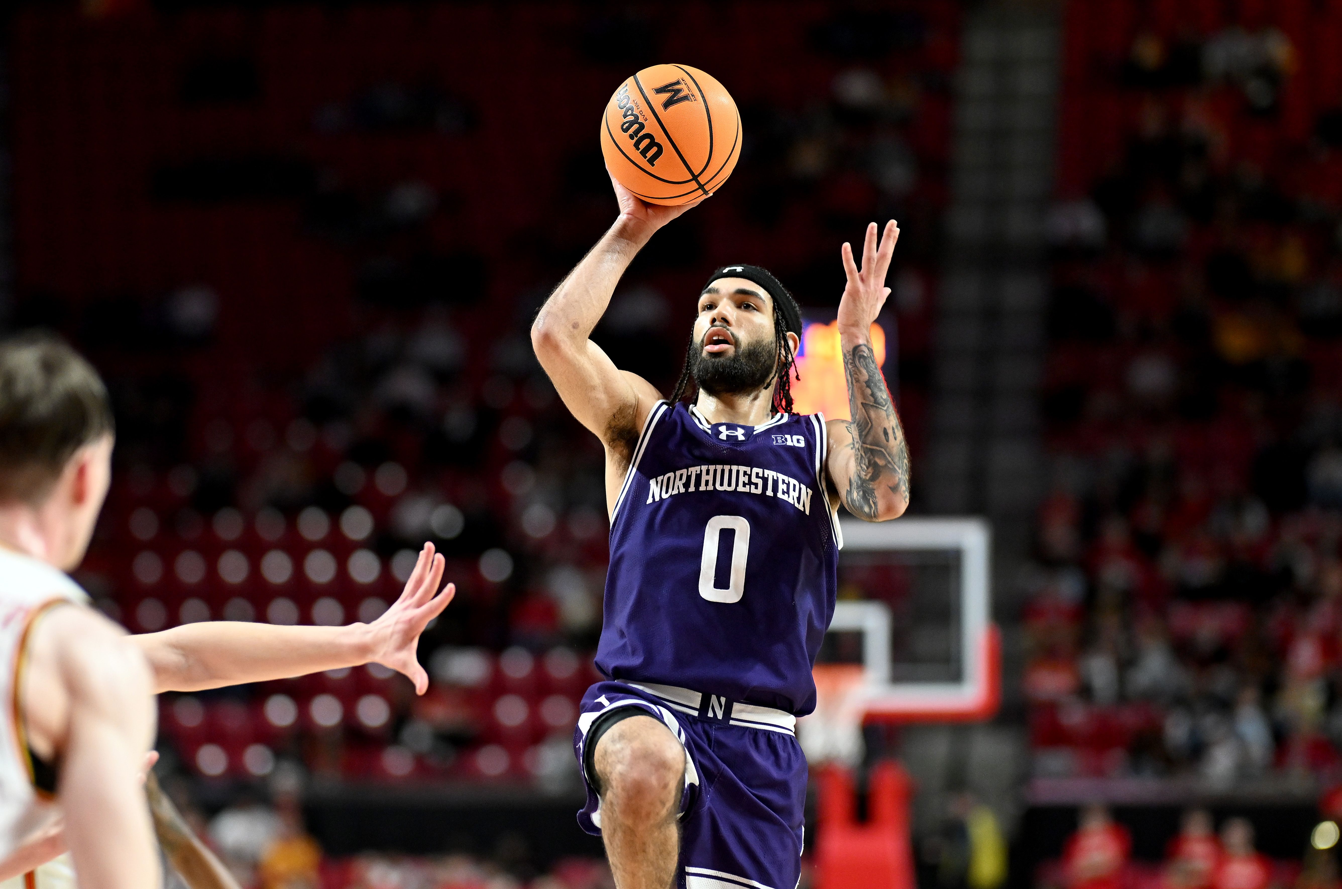 Photo of a basketball player shooting a basketball