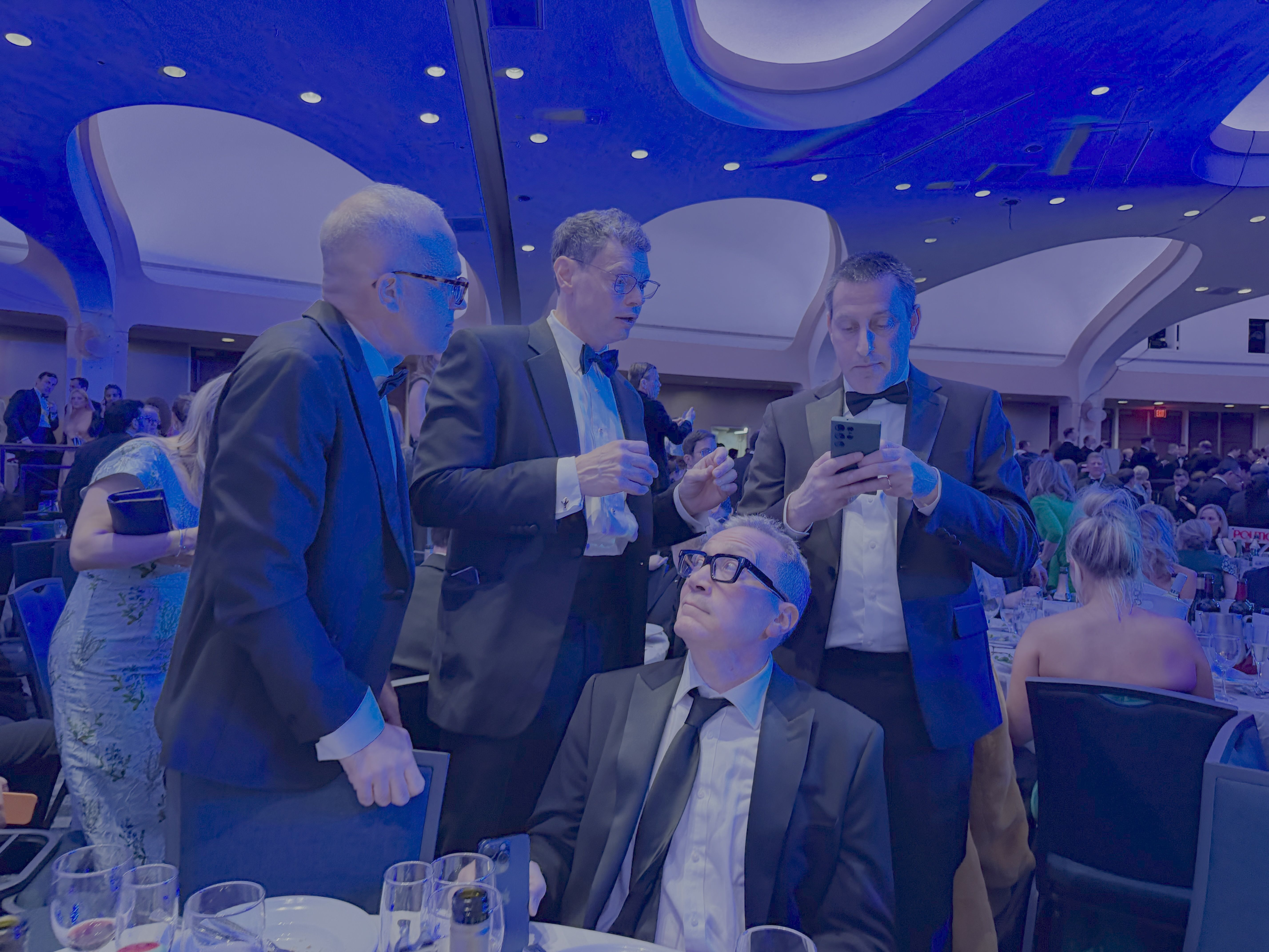 Axios' Barak Ravid files from the darkened ballroom last night, with reporting from Alex Isenstadt (left) and Hans Nichols